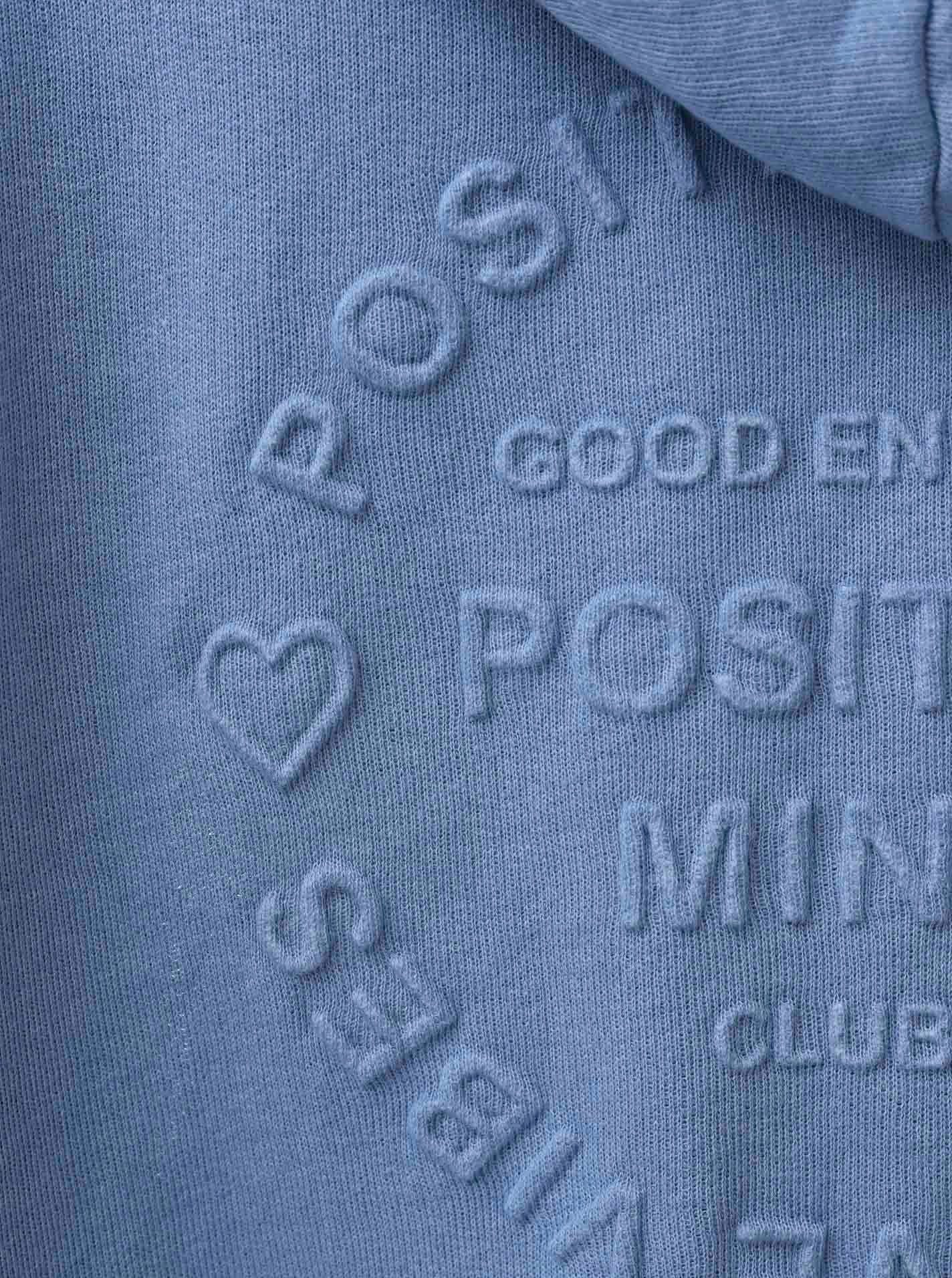 Zwillingsherz Jersey jas Positive Mind met capuchon en "positiv mind" opschrift op de achterkant