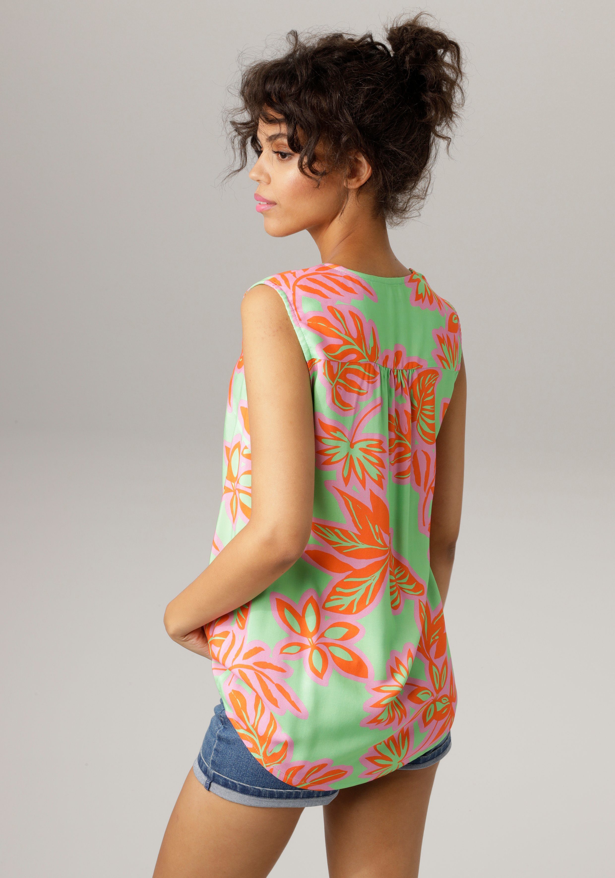 Aniston CASUAL Top met kleurintensieve, grootbladige print