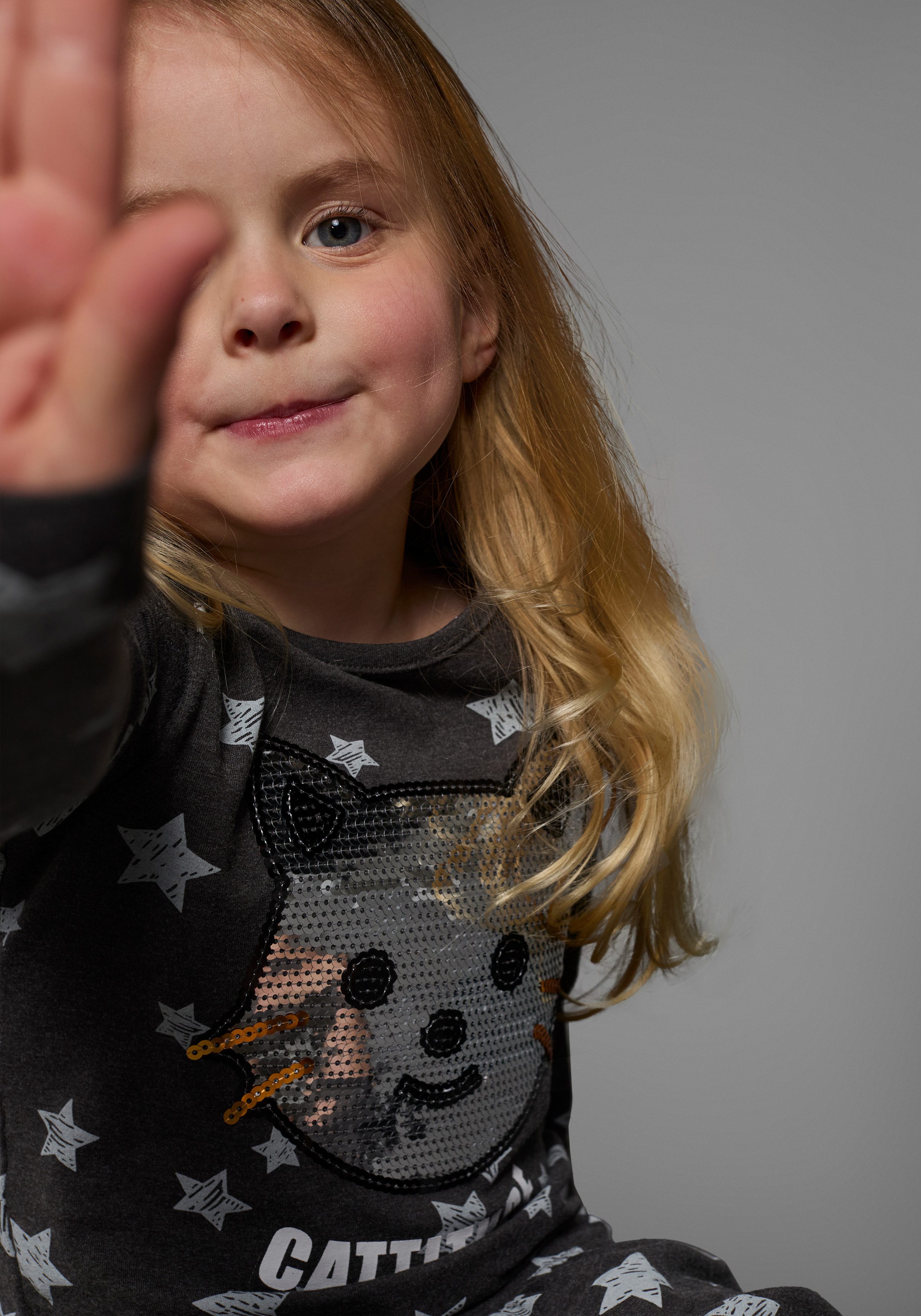 KIDSWORLD Jerseyjurk met pailletten feestelijke gelegenheden, uitlopende pasvorm