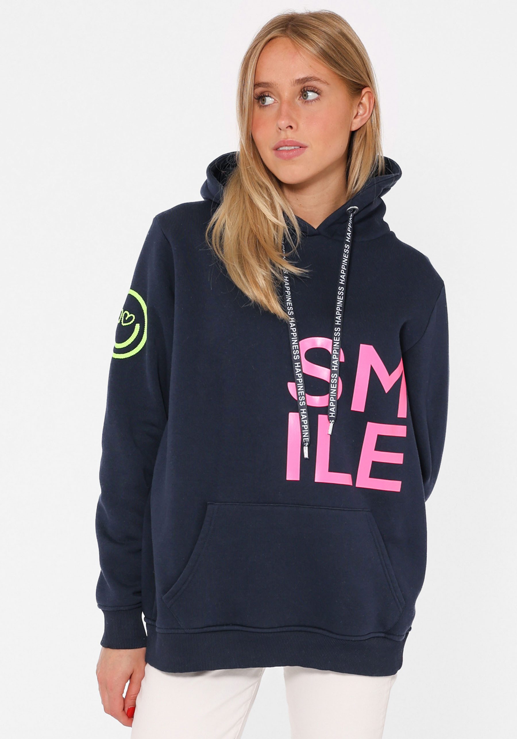 Zwillingsherz Hoodie met smile-opdruk in neonkleur en geborduurde smiley