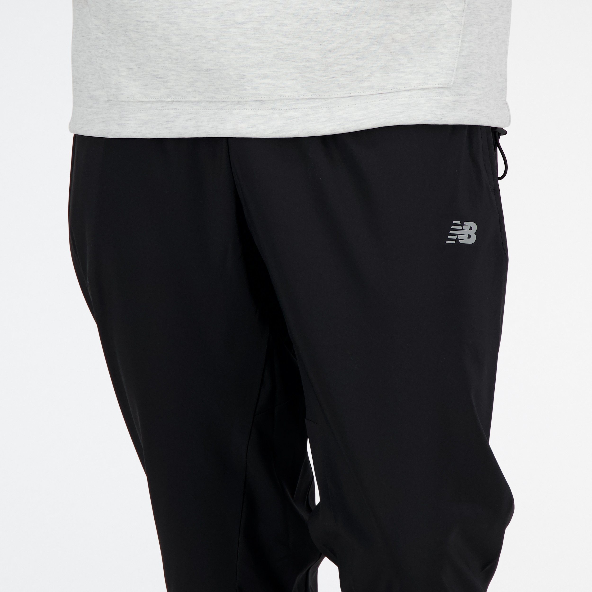 New Balance Trainingsbroek SPORT ESSENTIALS WOVEN JOGGER