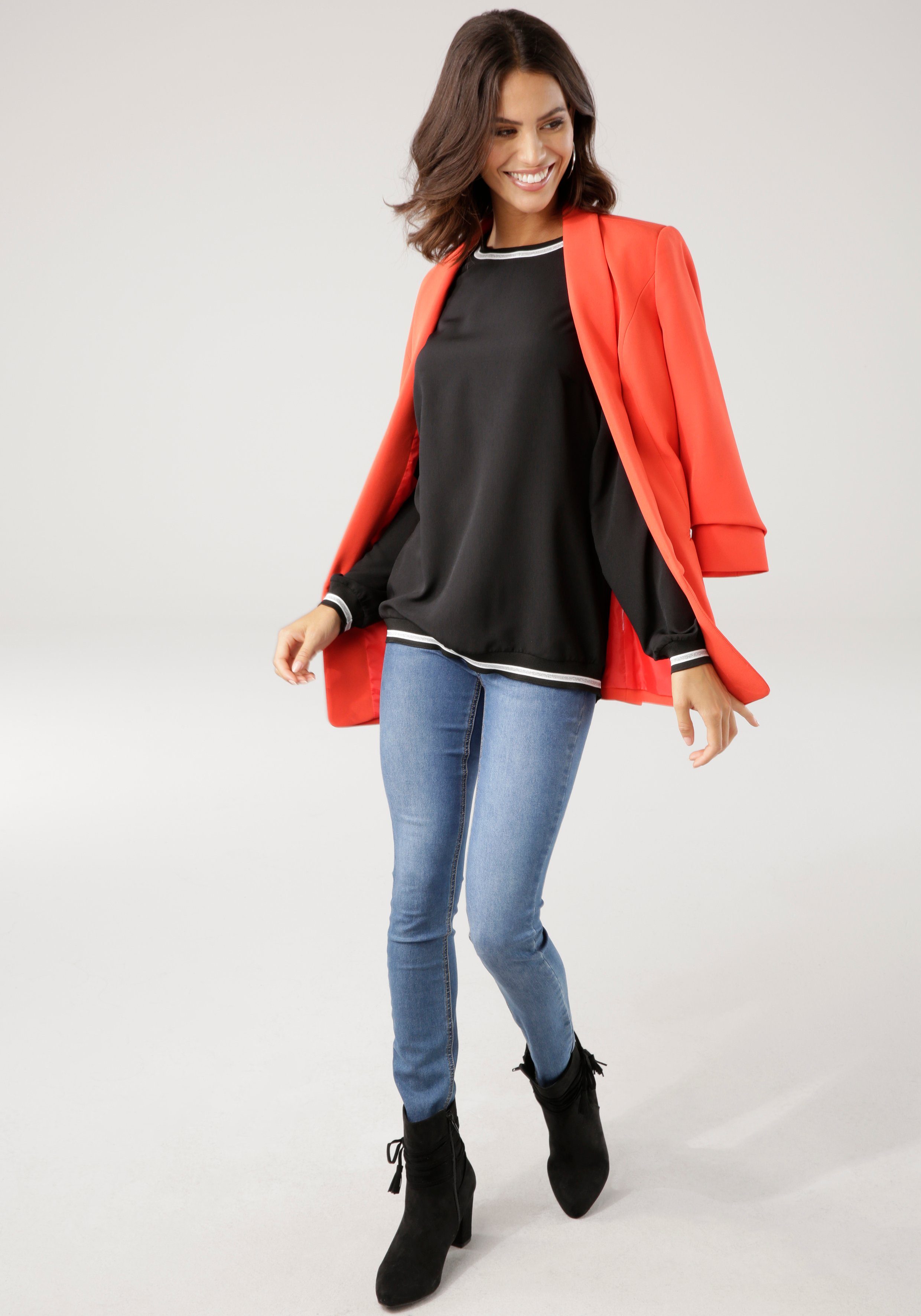 Laura Scott Blouse zonder sluiting met contrasterende band van glansgaren