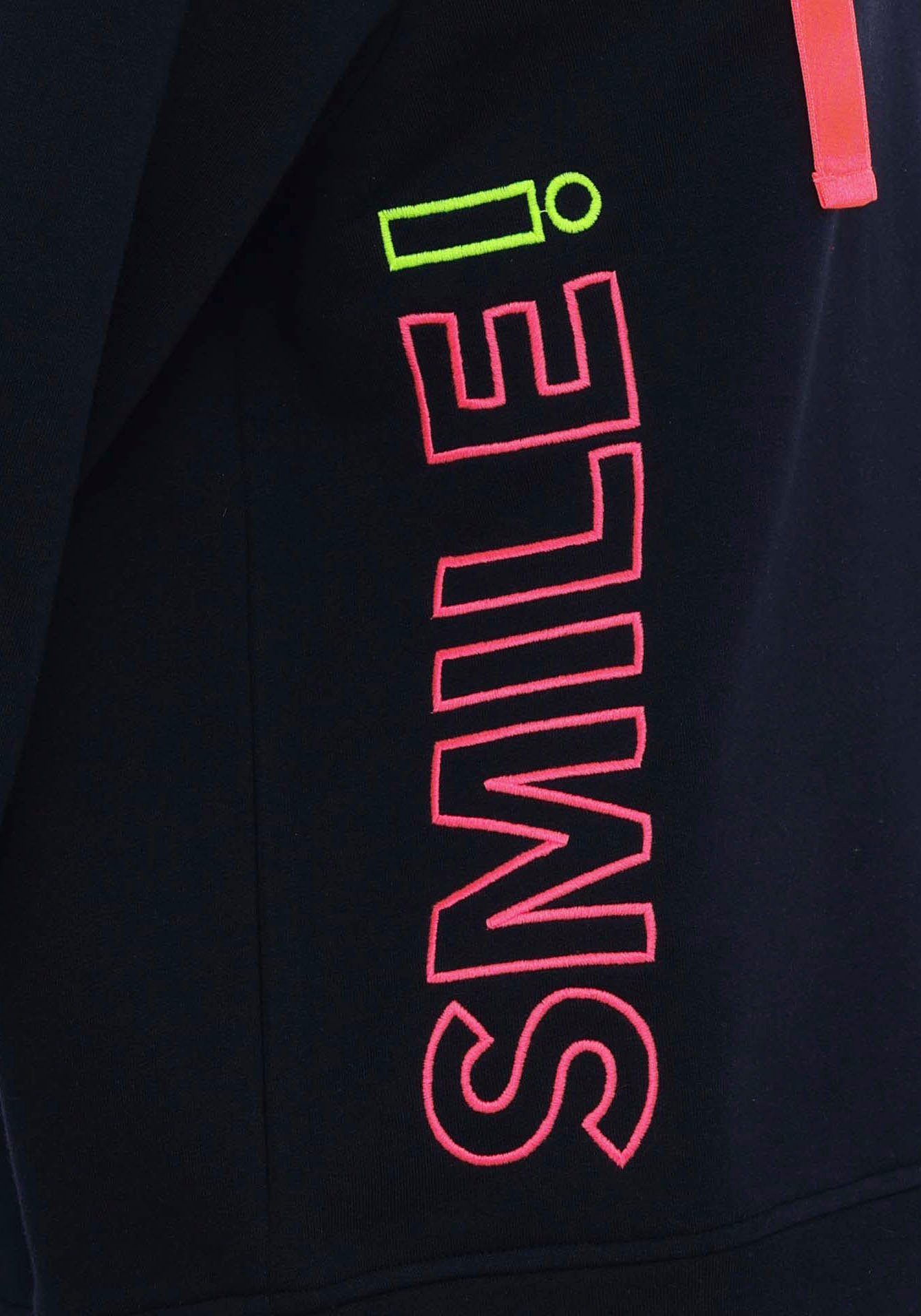 Zwillingsherz Sweatshirt Smile met brede banden, v-halslijn en details in neonkleuren