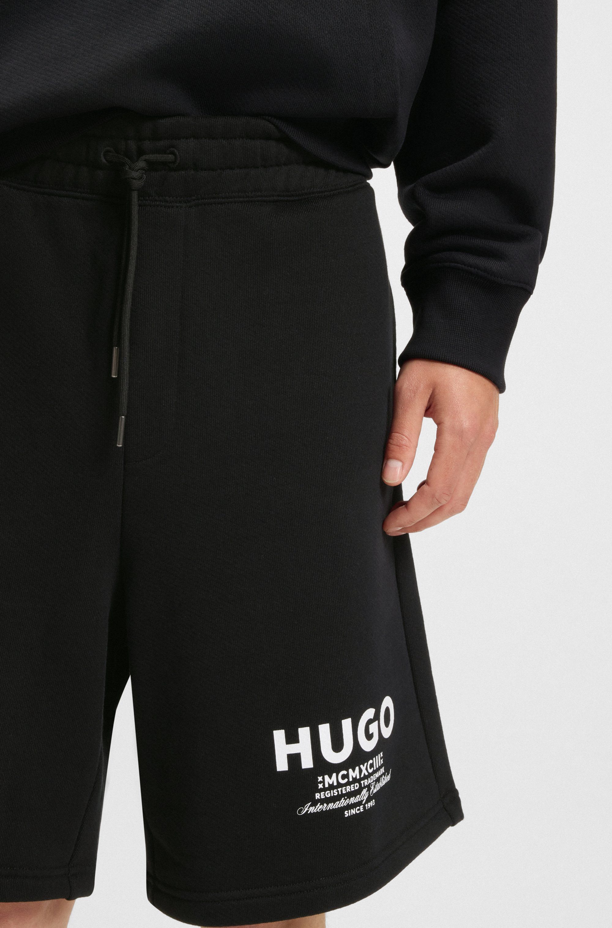 HUGO Blue Sweatshort Nomario met grote print