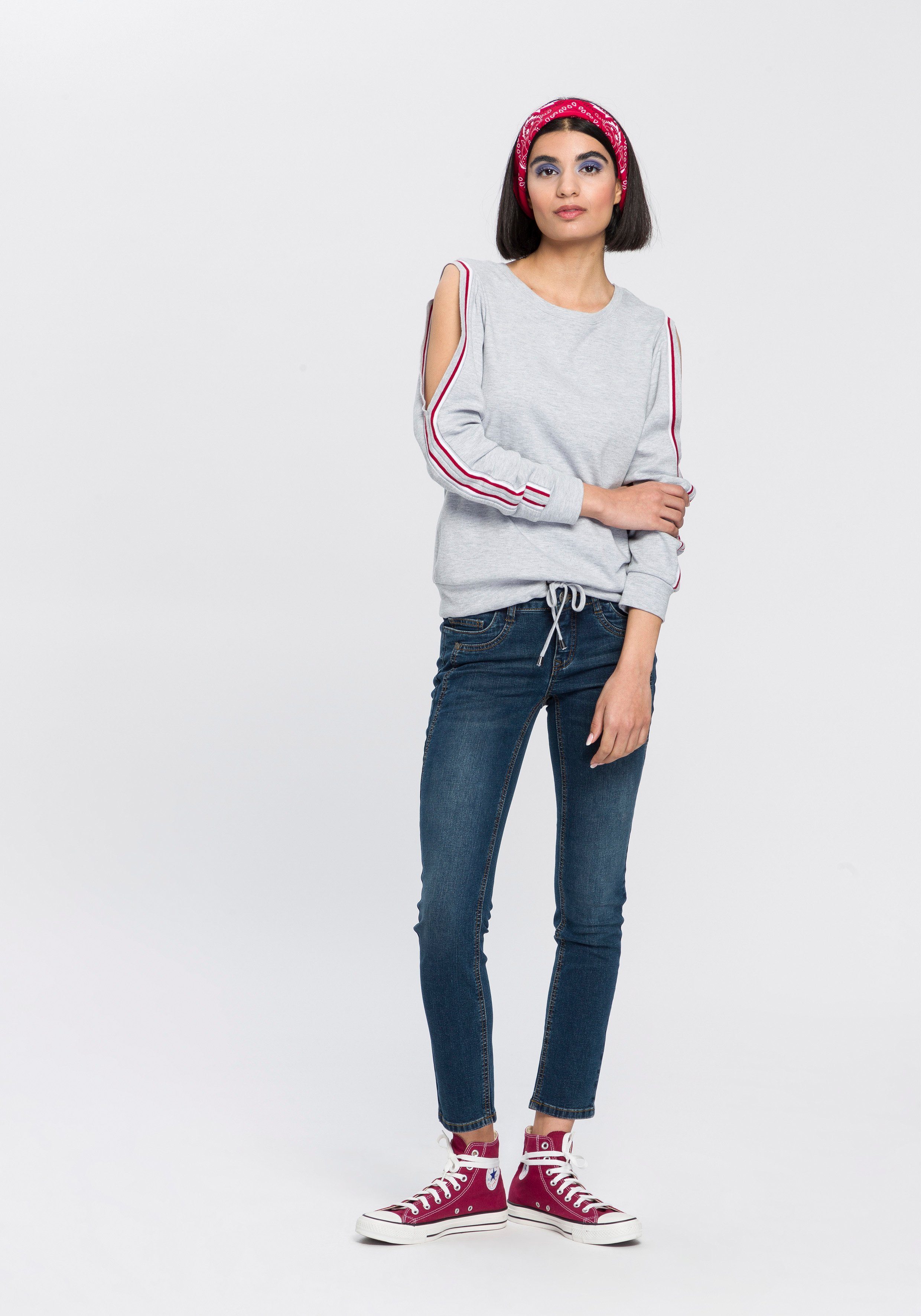 Arizona 7/8 jeans Met geren extra-strakke snit, used-look-wassing, lage taille