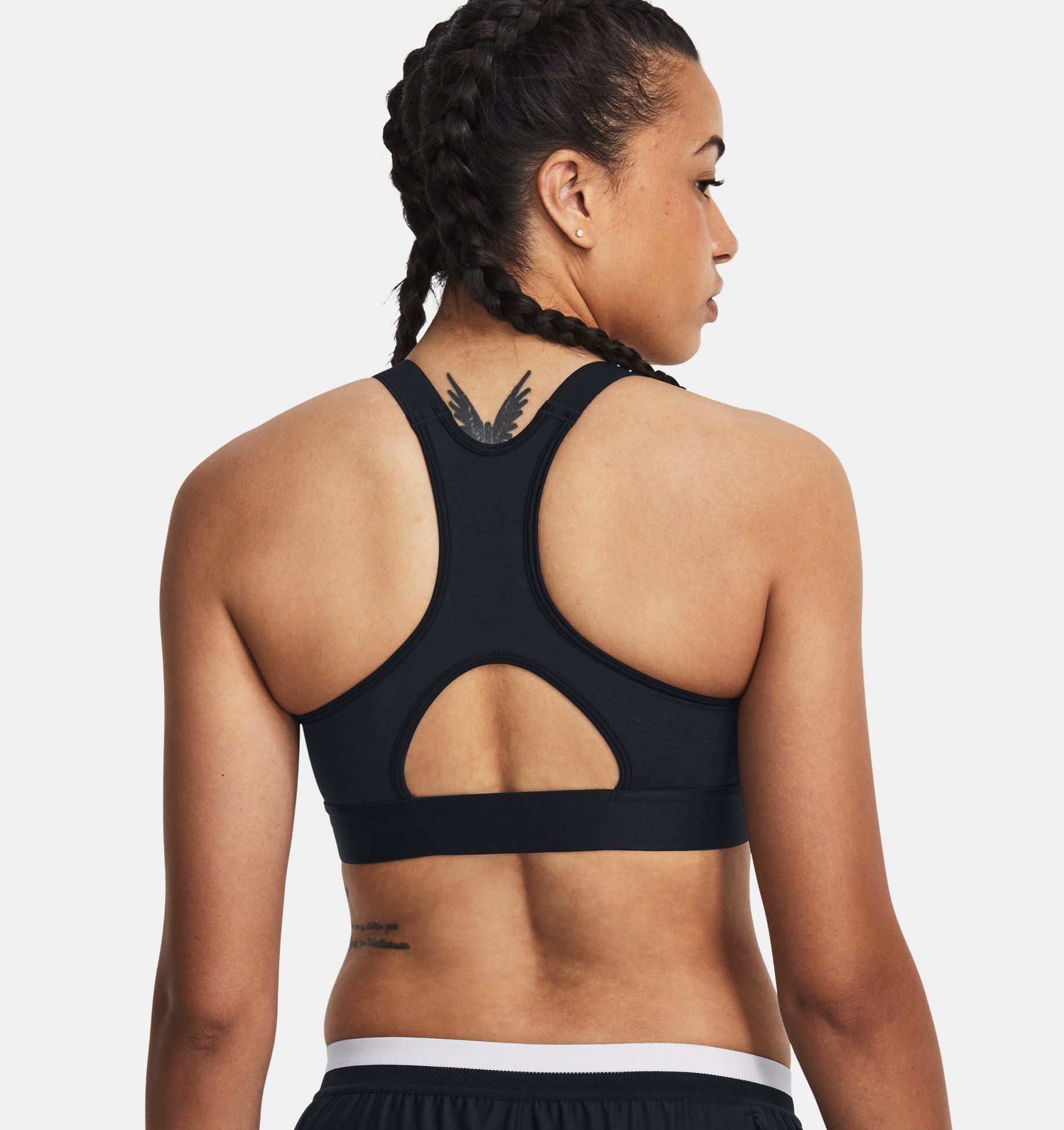Under Armour® Sport-bh HeatGear® Perfect voor de warme dagen. Houdt je koel en droog.