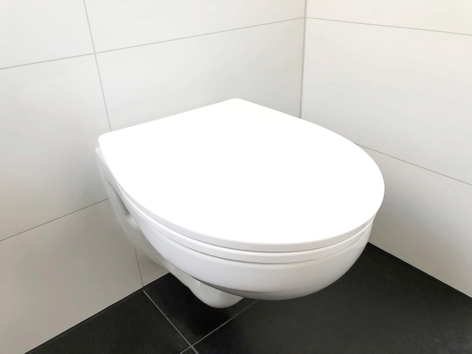 ADOB Toiletzitting Wit Soft-closemechanisme, voor het schoonmaken met één druk op de knop afneembaar