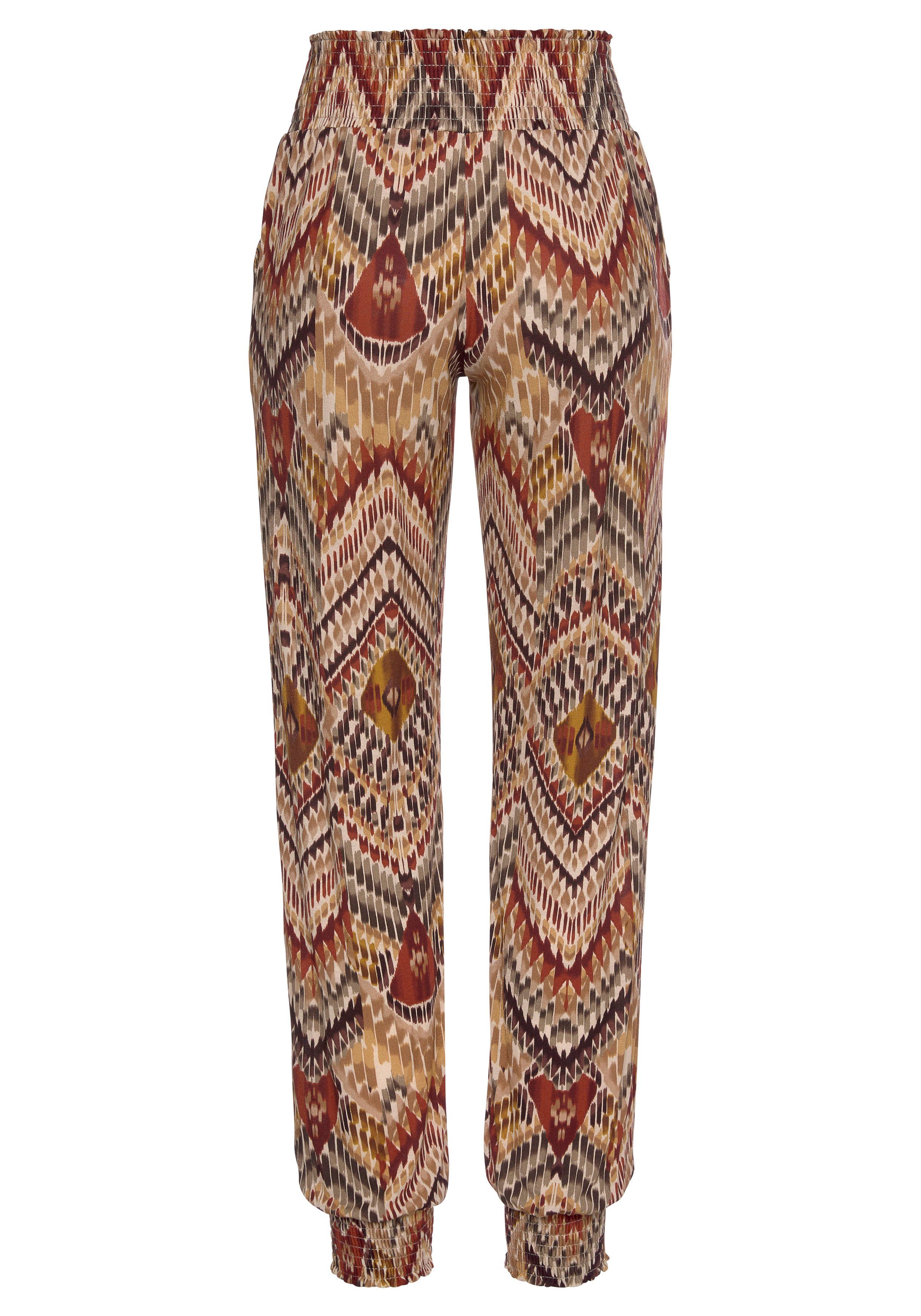 Lascana Jerseybroek met etnische print en zakken, losse pasvorm
