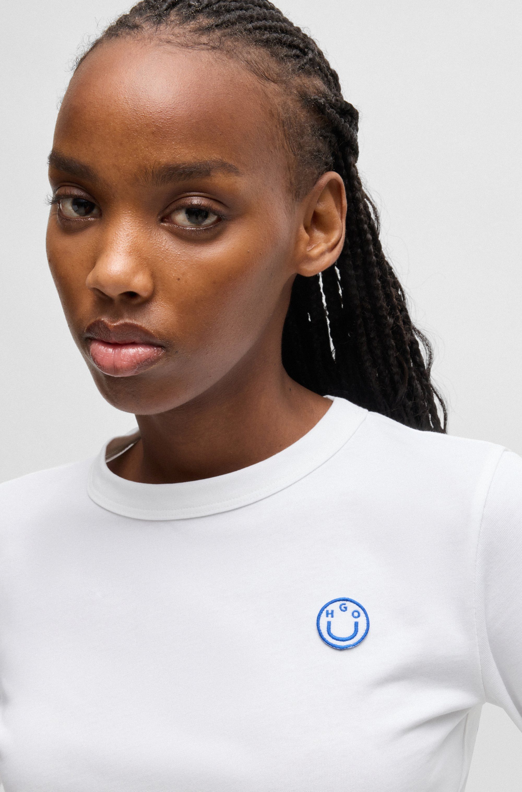 HUGO Blue Longsleeve Daliria met label-badge met happy hugo logo
