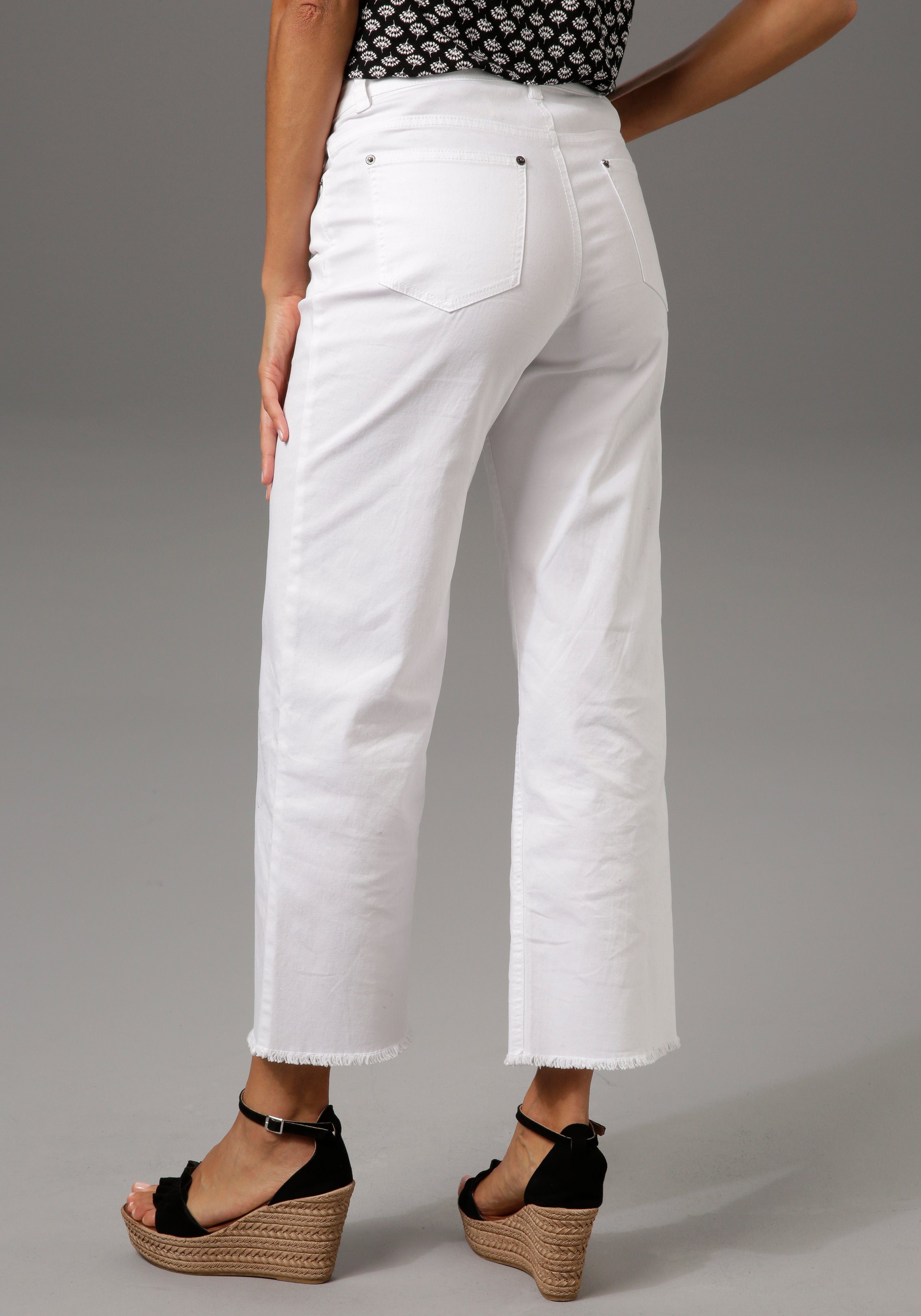 Aniston CASUAL 7/8 jeans met iets gerafelde voetzoom