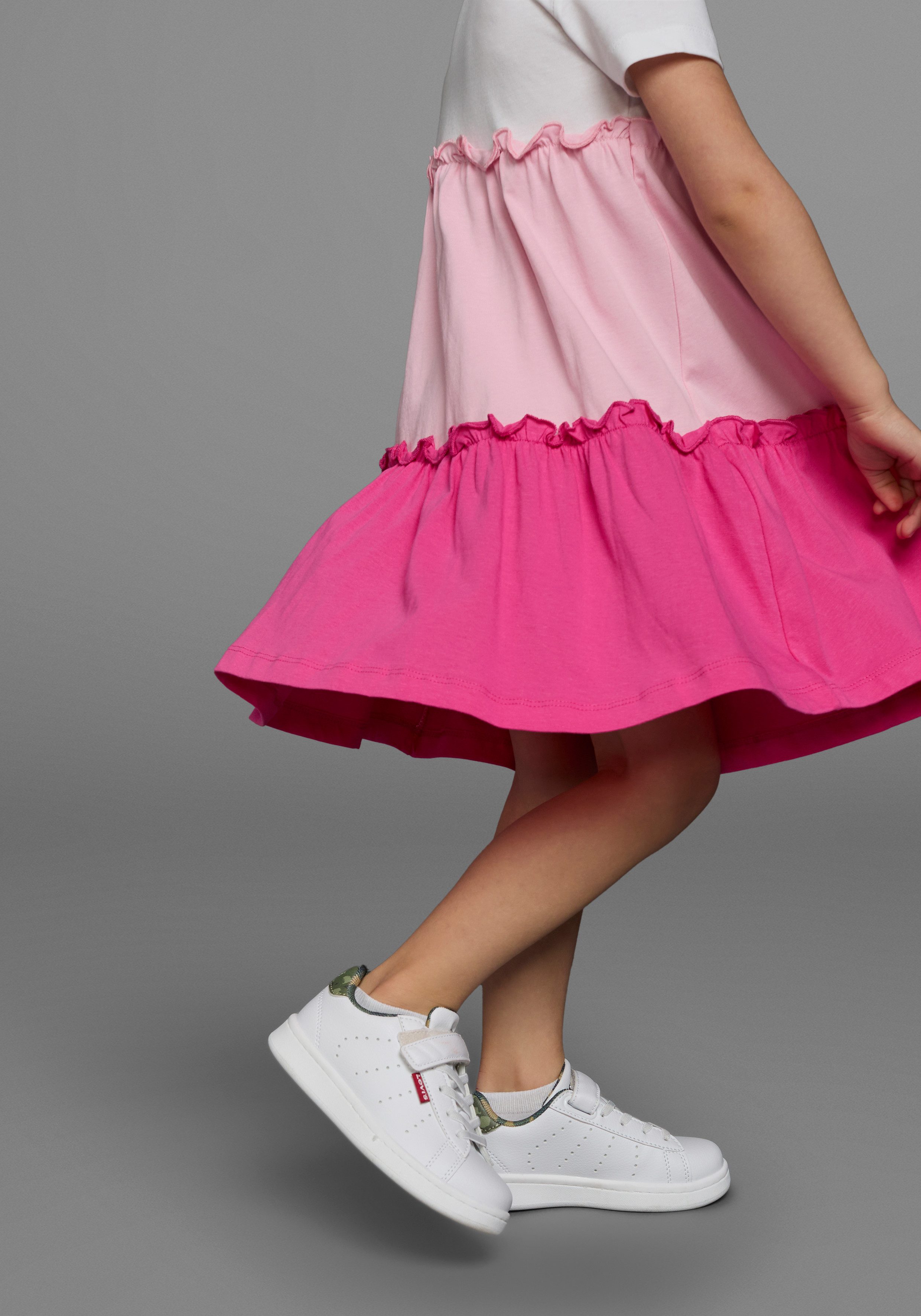 KIDSWORLD Jerseyjurk - Volantjurk voor kleine meisjes feestelijke gelegenheden, knie-vrije lengte, speelse stijl