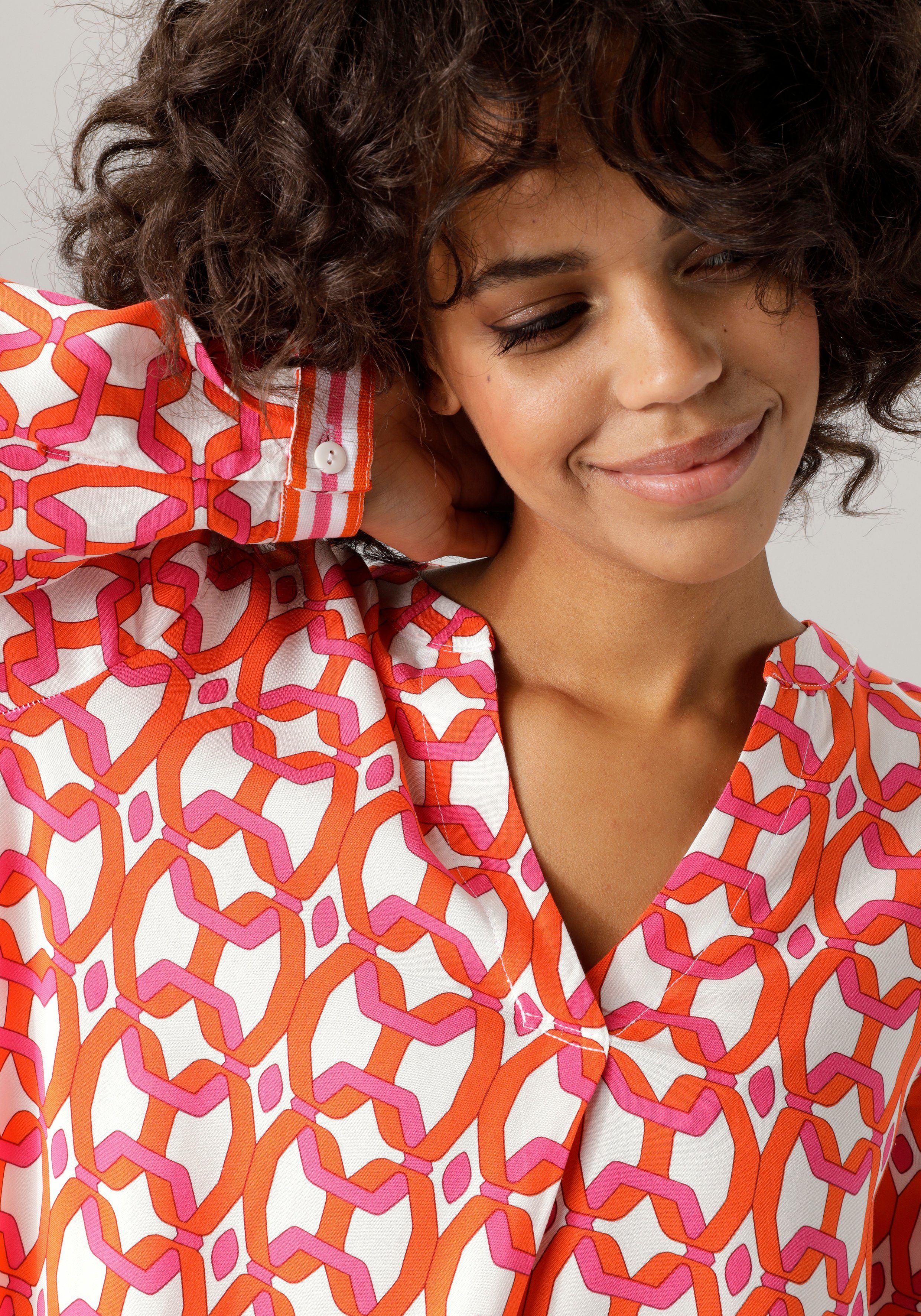 Aniston CASUAL Blouse zonder sluiting met opvallende, grafische print