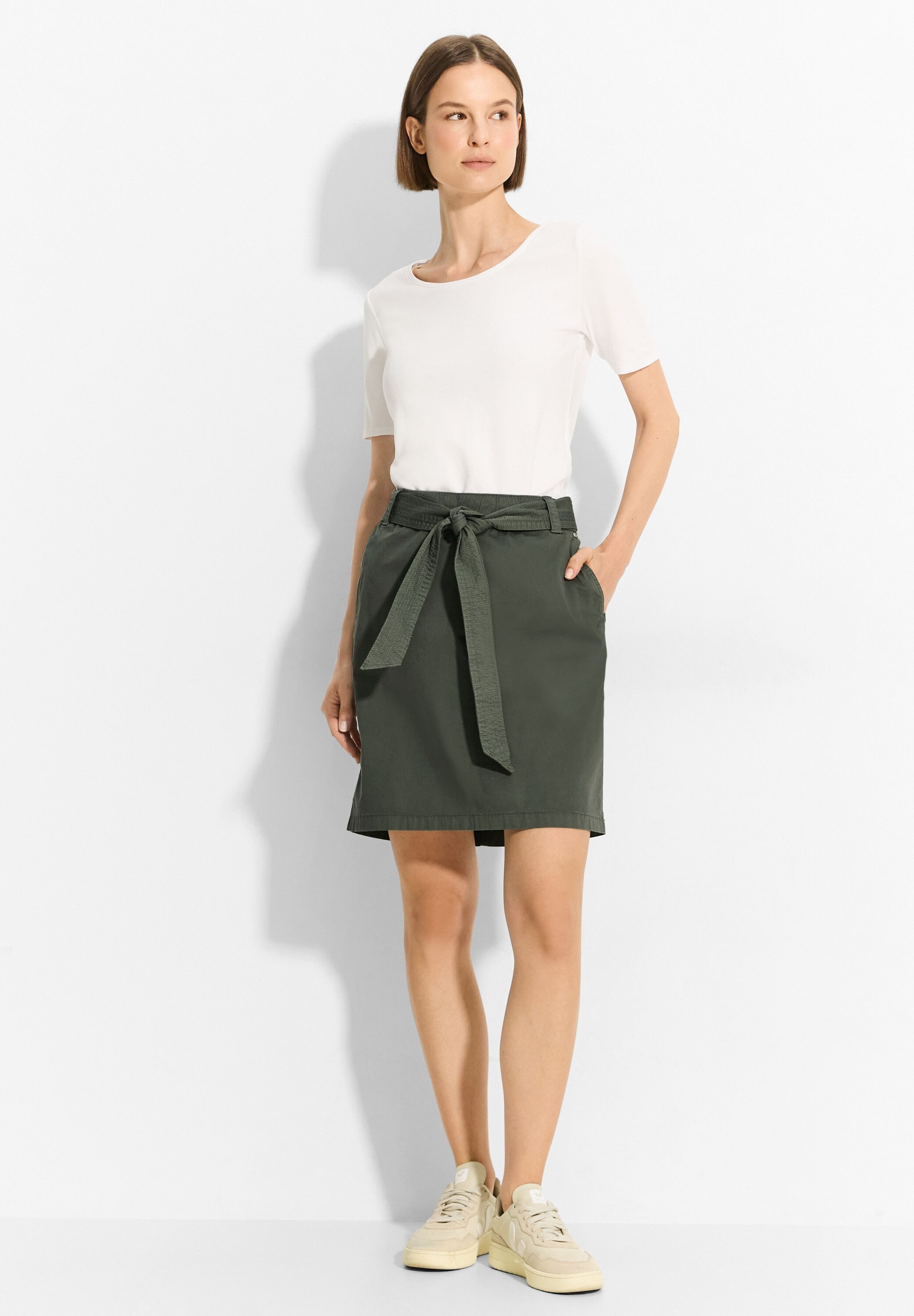 Cecil Midirok met textielen riem