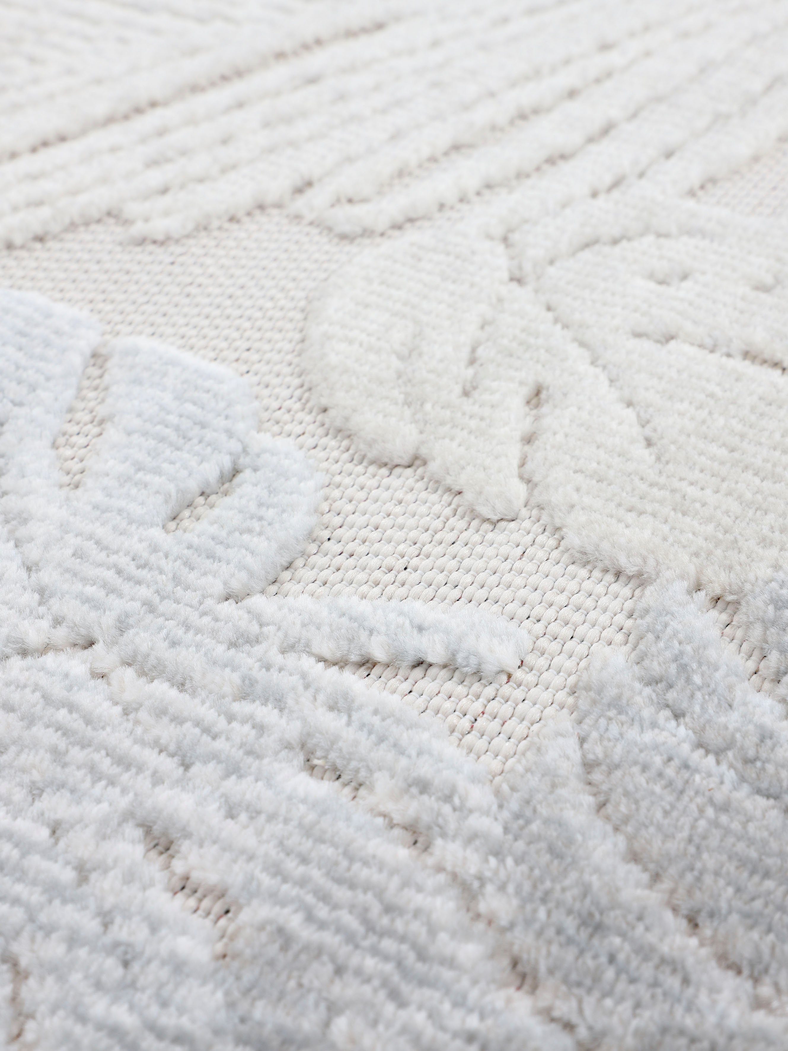 carpetfine Vloerkleed Deja 104 robust vlakweefsel, motief - florale palmbladeren, hoog-laag effect