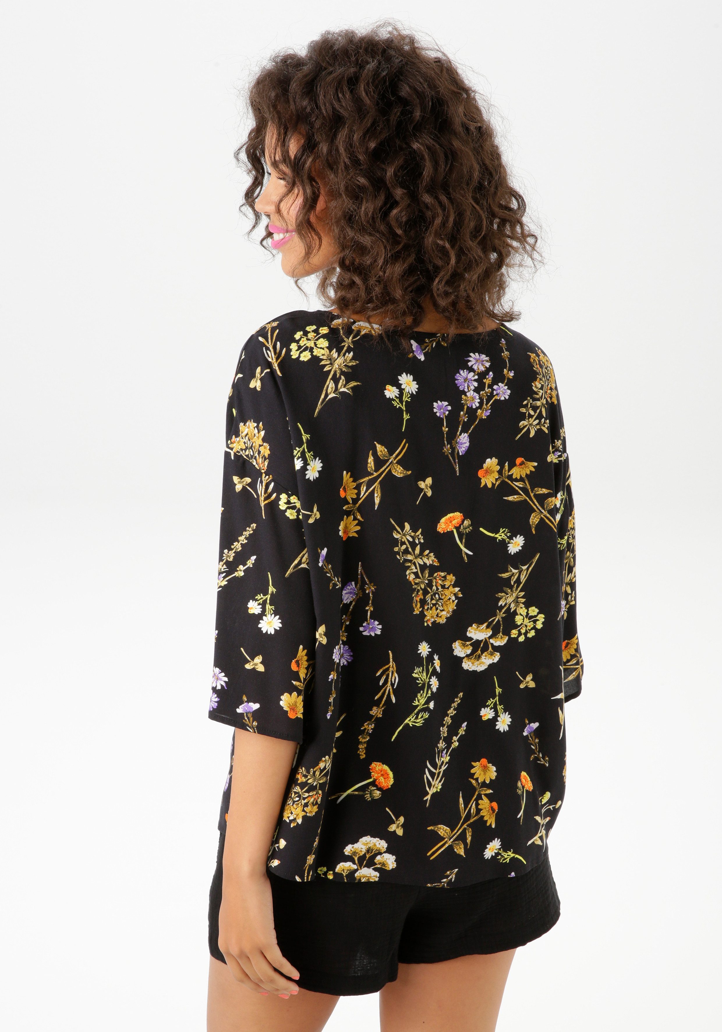 Aniston CASUAL Blouse zonder sluiting met kleurharmonische bloemenprint - nieuwe collectie