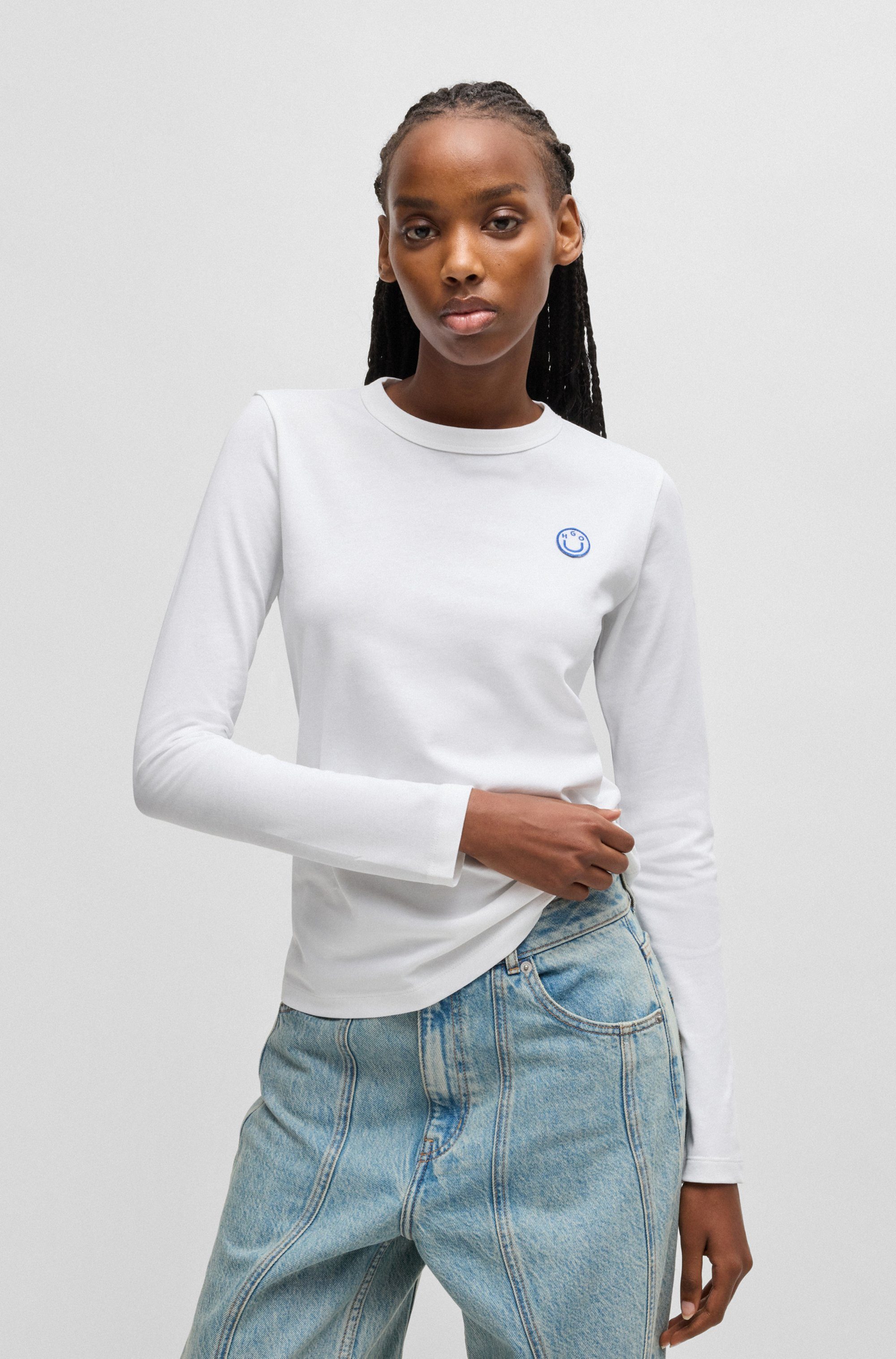 HUGO Blue Longsleeve Daliria met label-badge met happy hugo logo