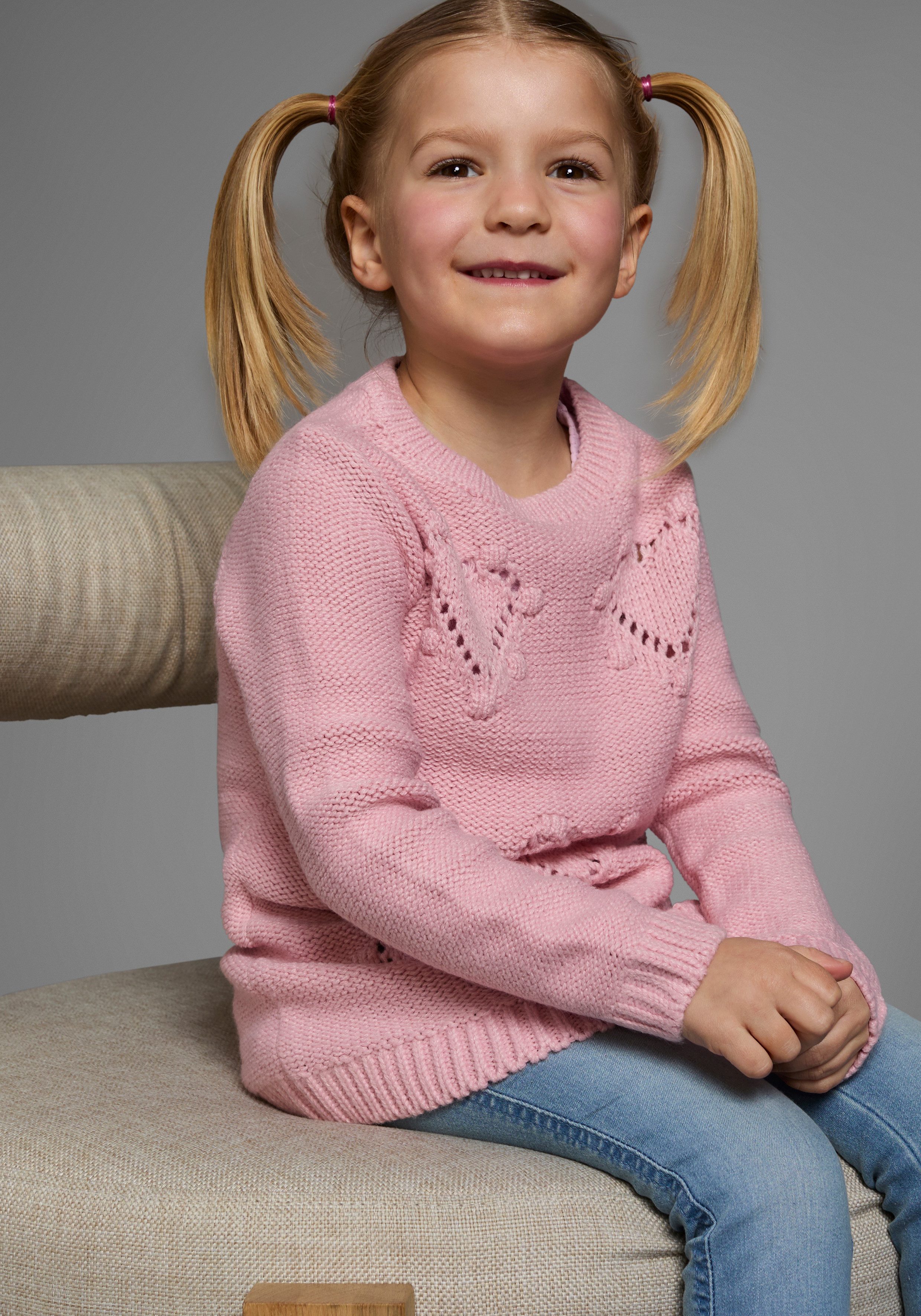 KIDSWORLD Gebreide trui Long sweater with heart pattern for little girls