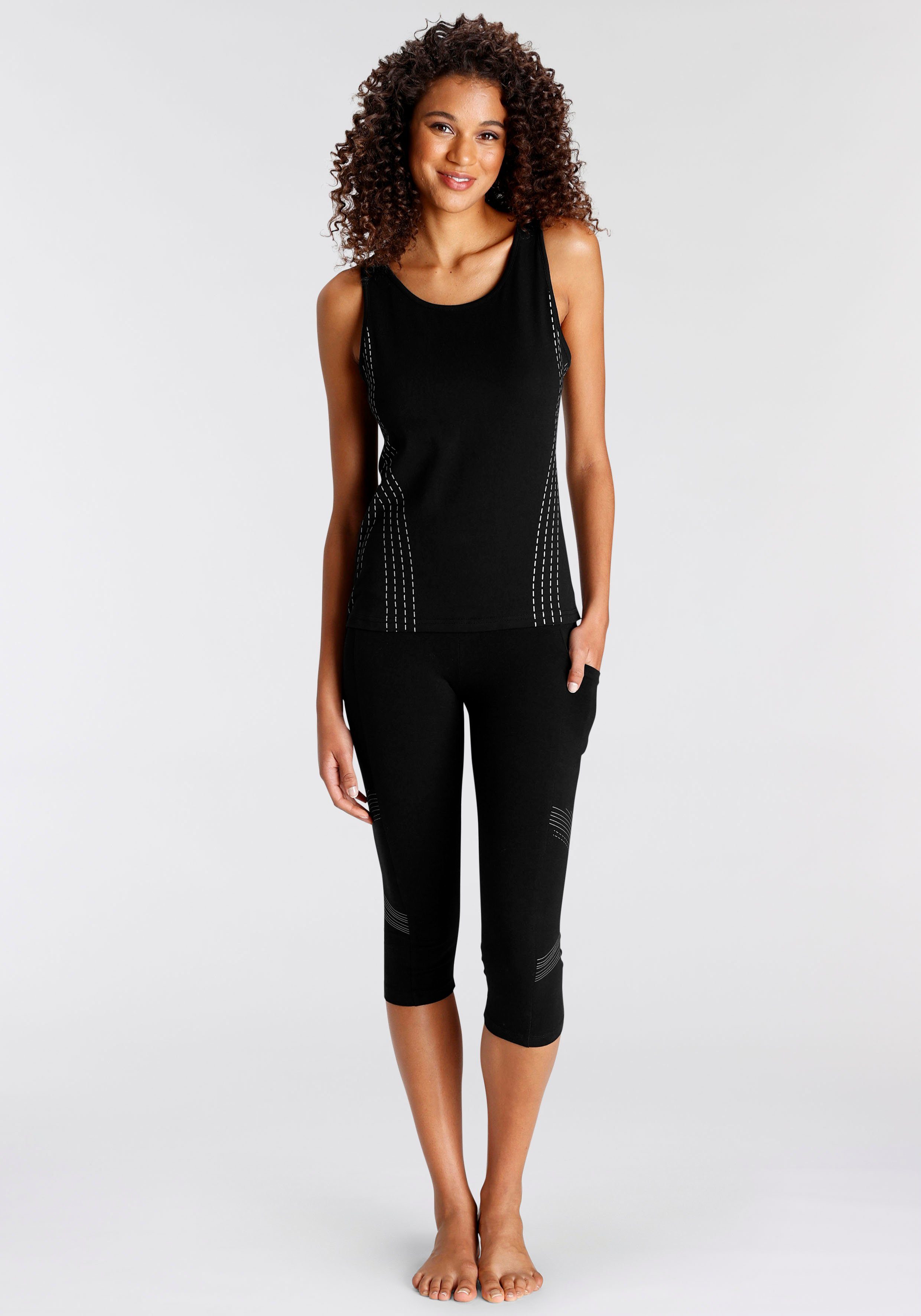 active by Lascana Caprilegging met optisch reflecterende print en tasje voor de mobiele telefoon