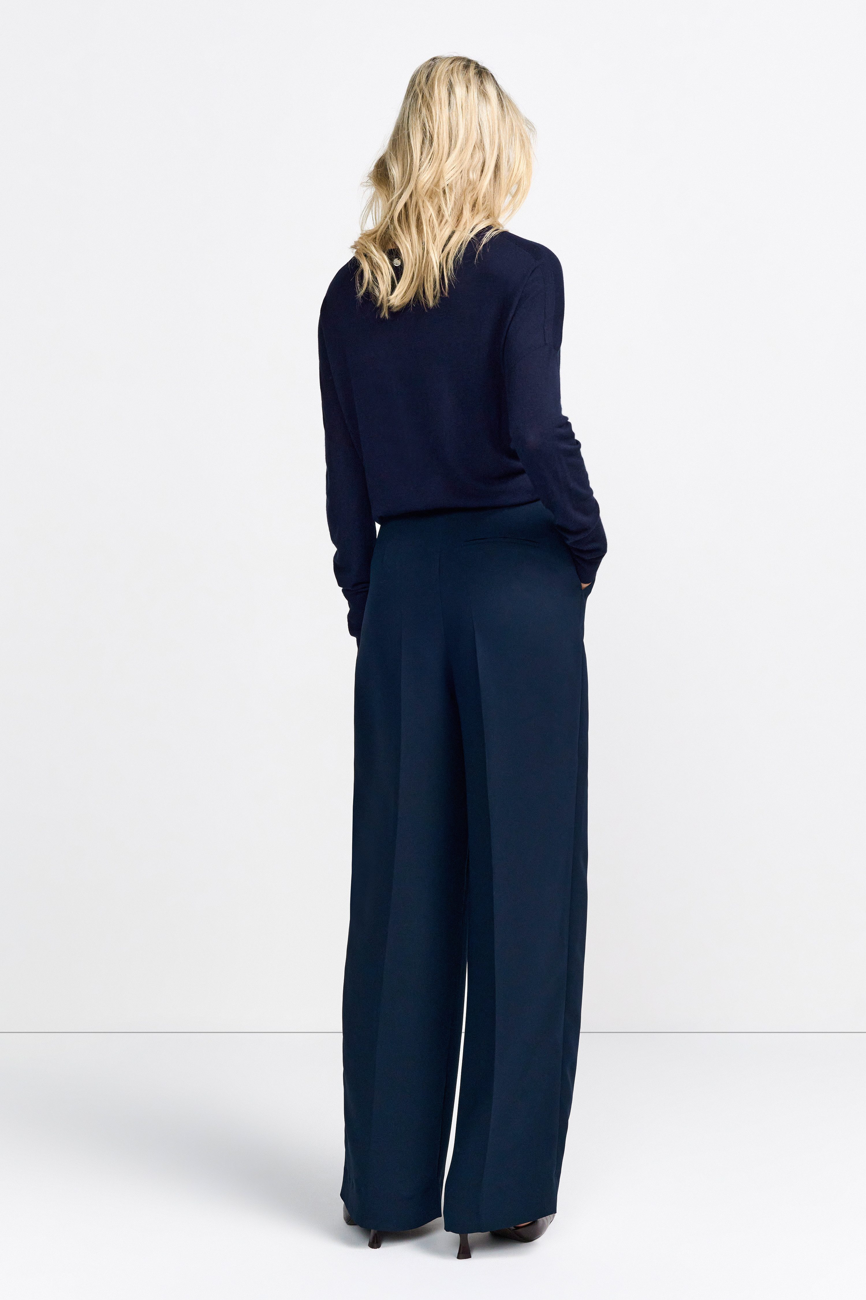Rich & Royal Pantalon met vouw Met merkenlabel boven de tas