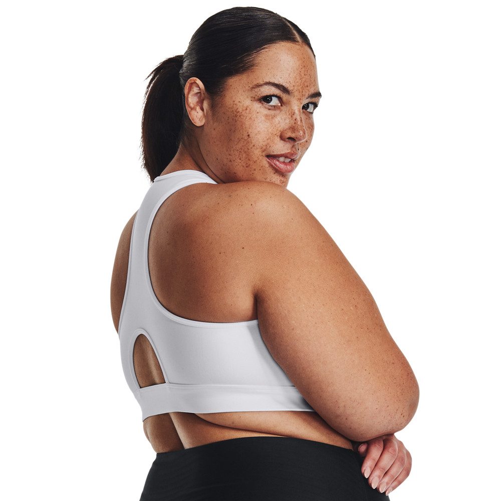 Under Armour® Sport-bh HeatGear® Perfect voor de warme dagen. Houdt je koel en droog.