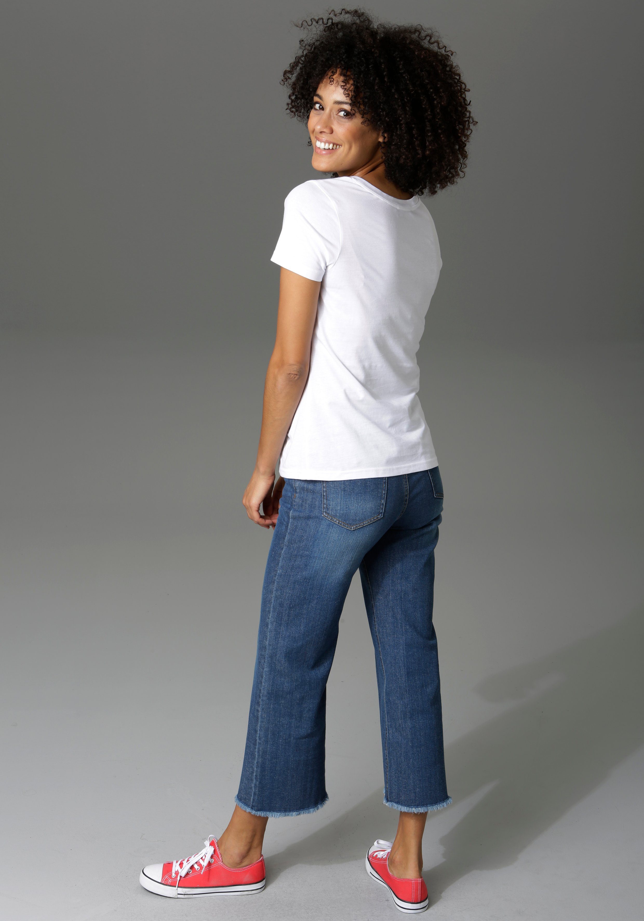 Aniston CASUAL 7/8 jeans met iets gerafelde voetzoom