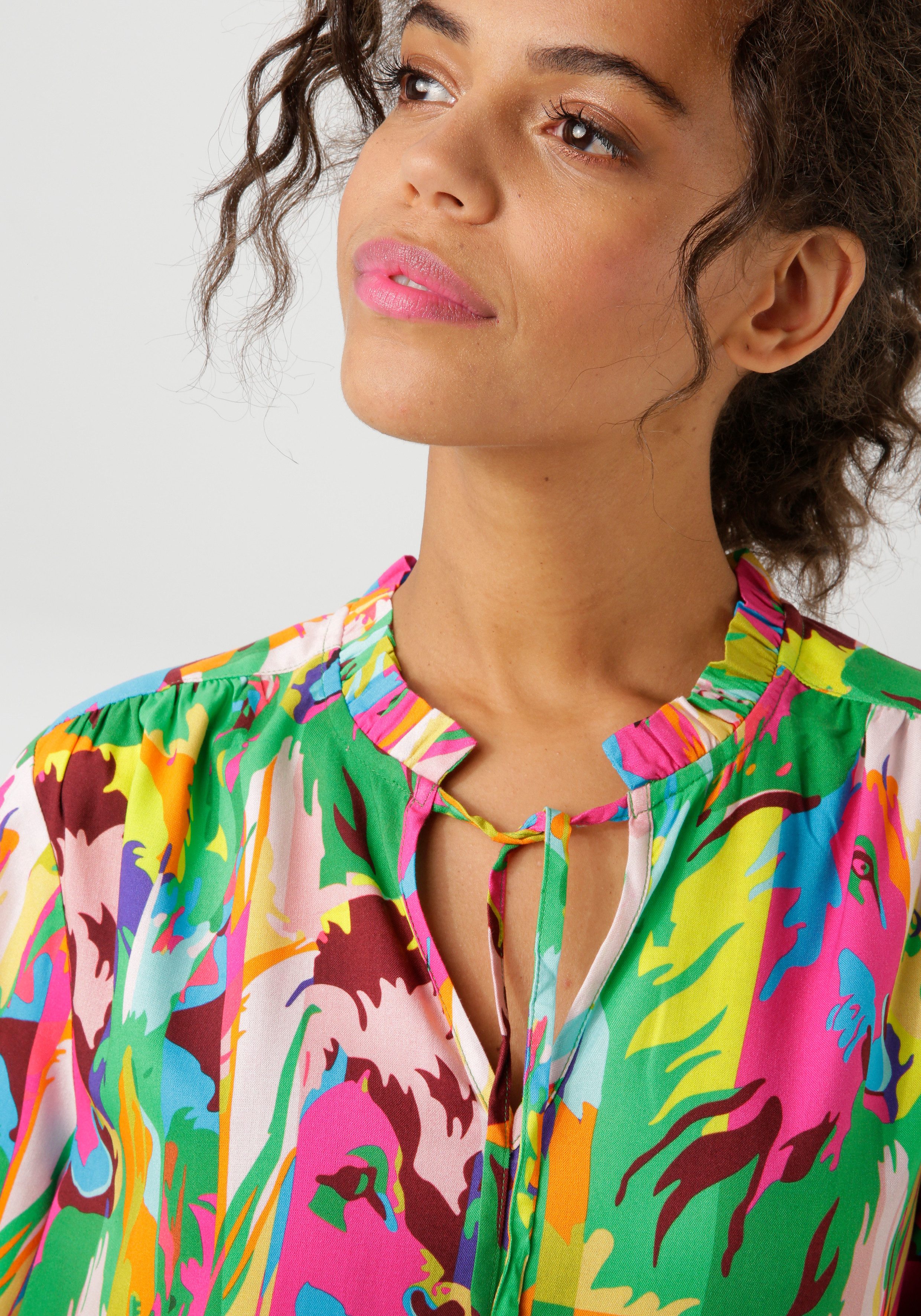 Aniston CASUAL Blouse zonder sluiting met leeuwenkoppen in kleurrijke jungle-print