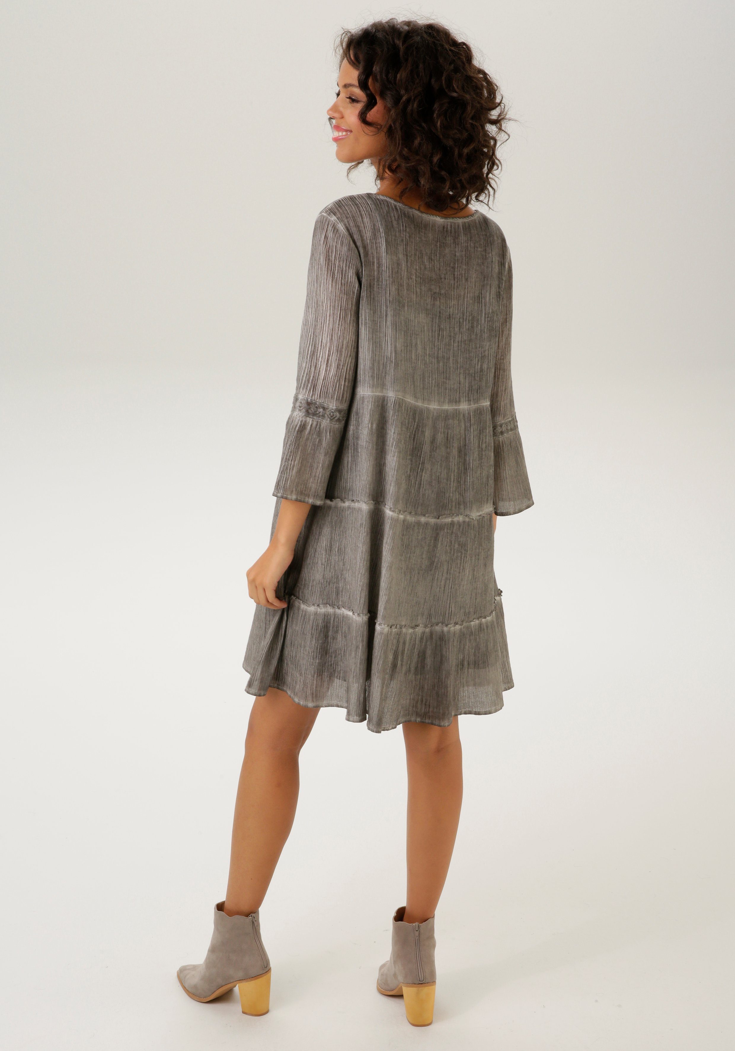 Aniston CASUAL Tuniekjurk met uitgebreide kantversiering (Met jersey onderjurk)