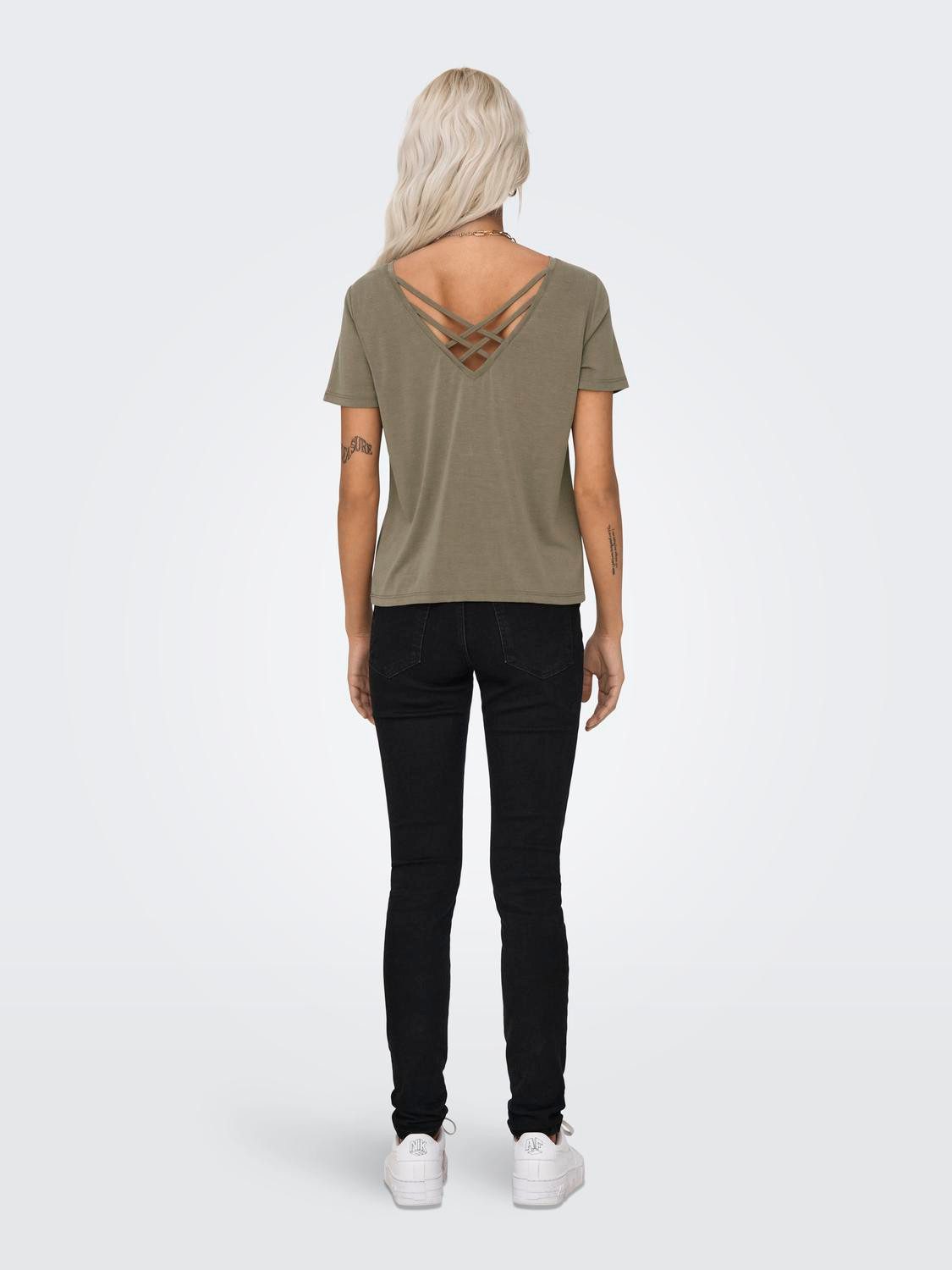 Only Shirt met korte mouwen ONLFREE LIFE S/S CROSS BACK TOP BOX JRS