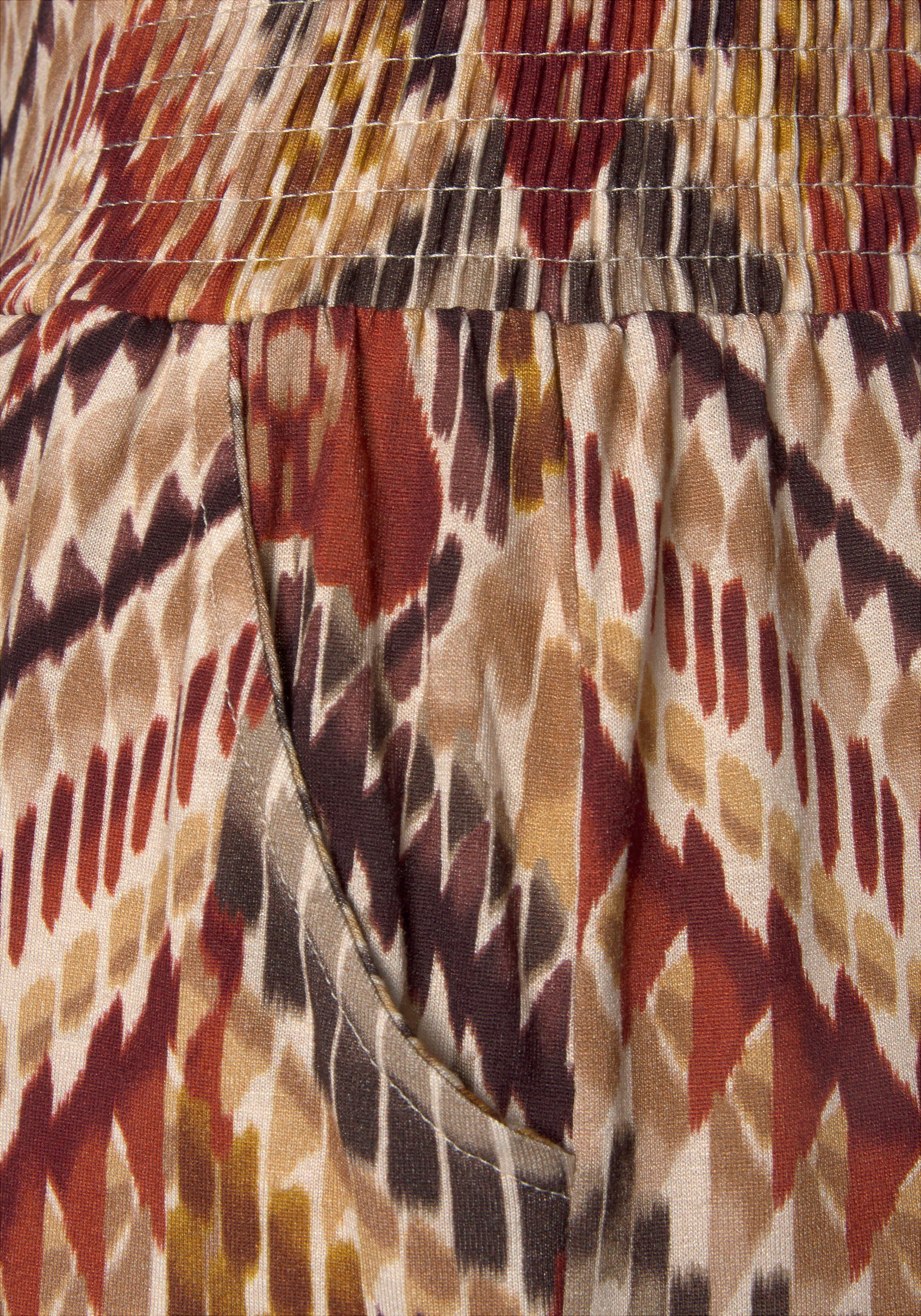 Lascana Jerseybroek met etnische print en zakken, losse pasvorm