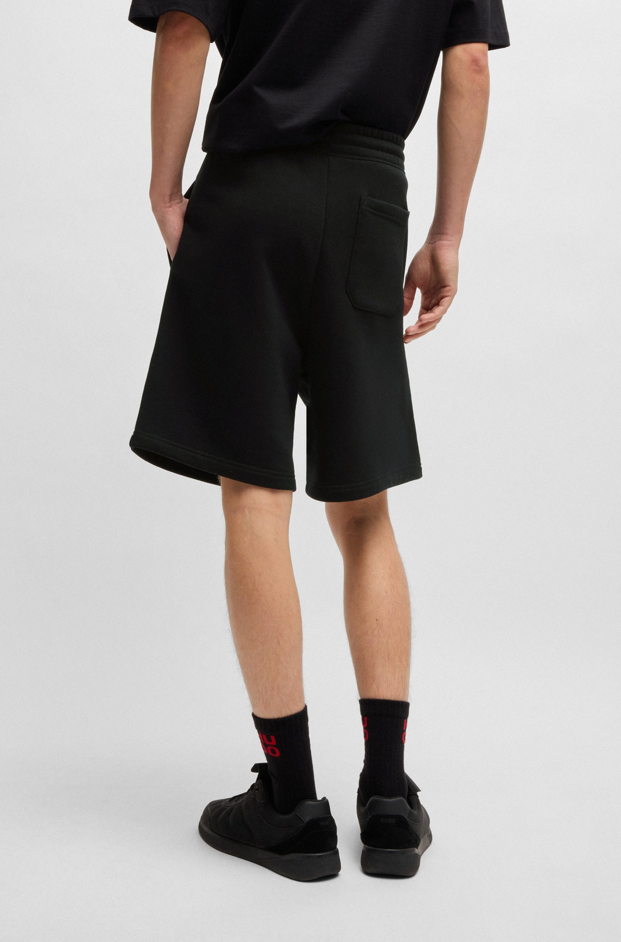 HUGO Blue Sweatshort Nomario met grote print