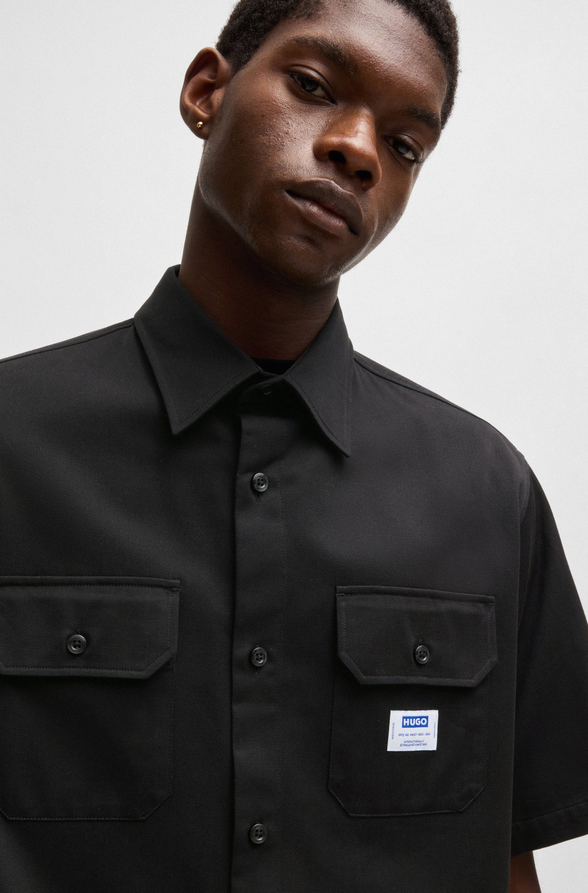 HUGO Blue Overhemd met korte mouwen Ekyno met contrasterend logo-badge op de borst