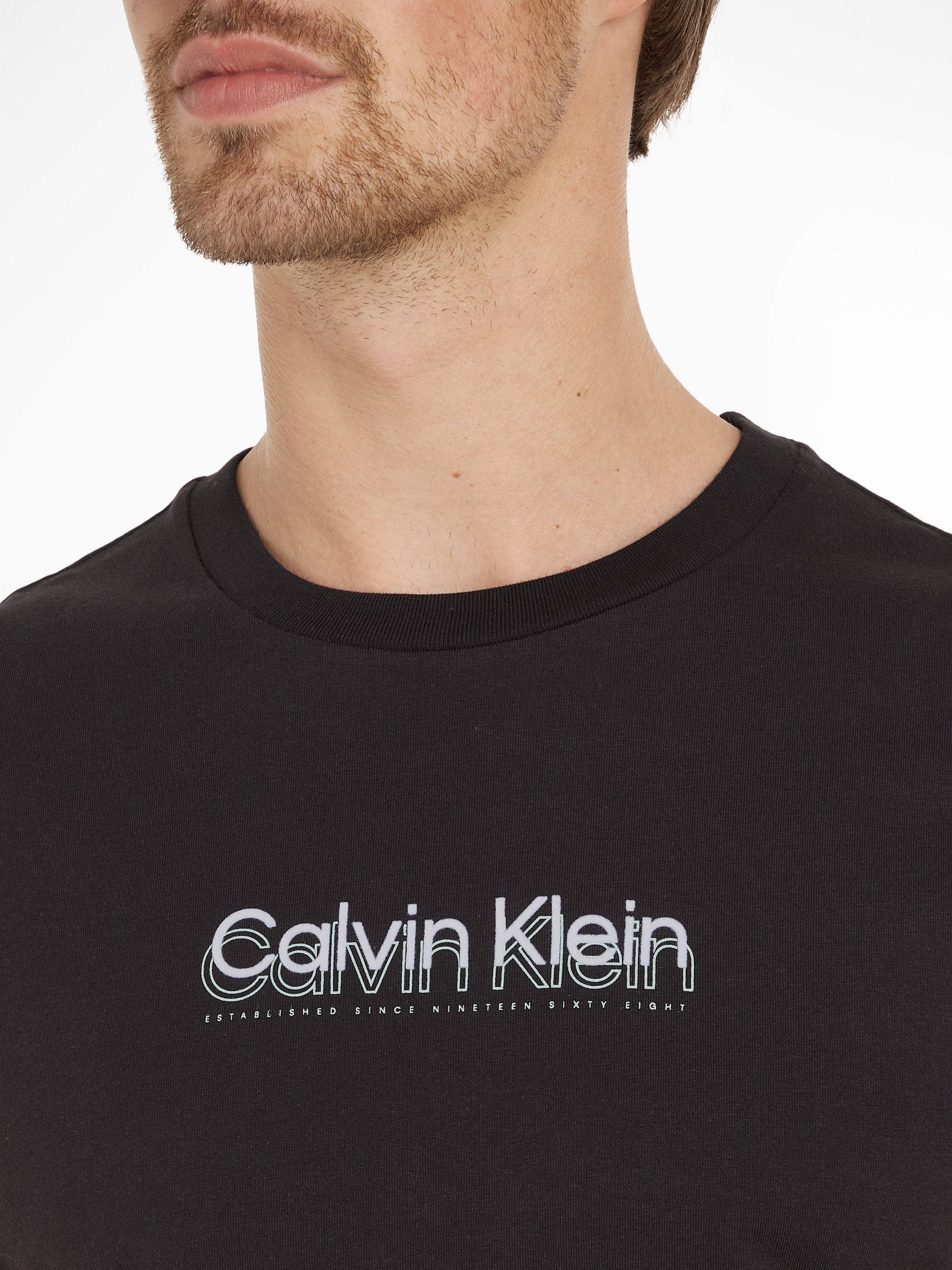 Calvin Klein T-shirt FLOCK LOGO T-SHIRT met een logo-opschrift
