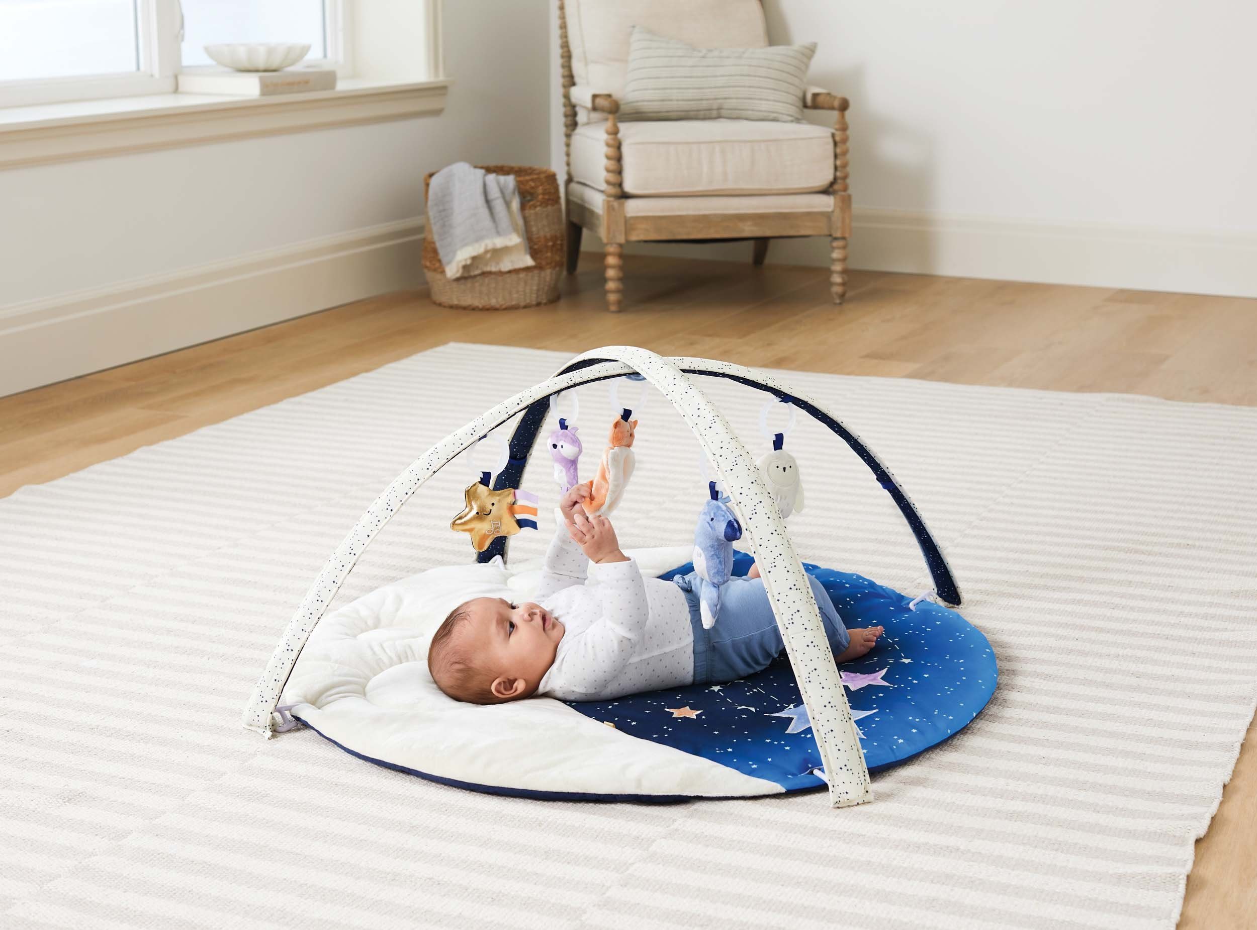 Skip Hop Babygym Celestrian Dreams speelboog met vijf stuks hangend speelgoed