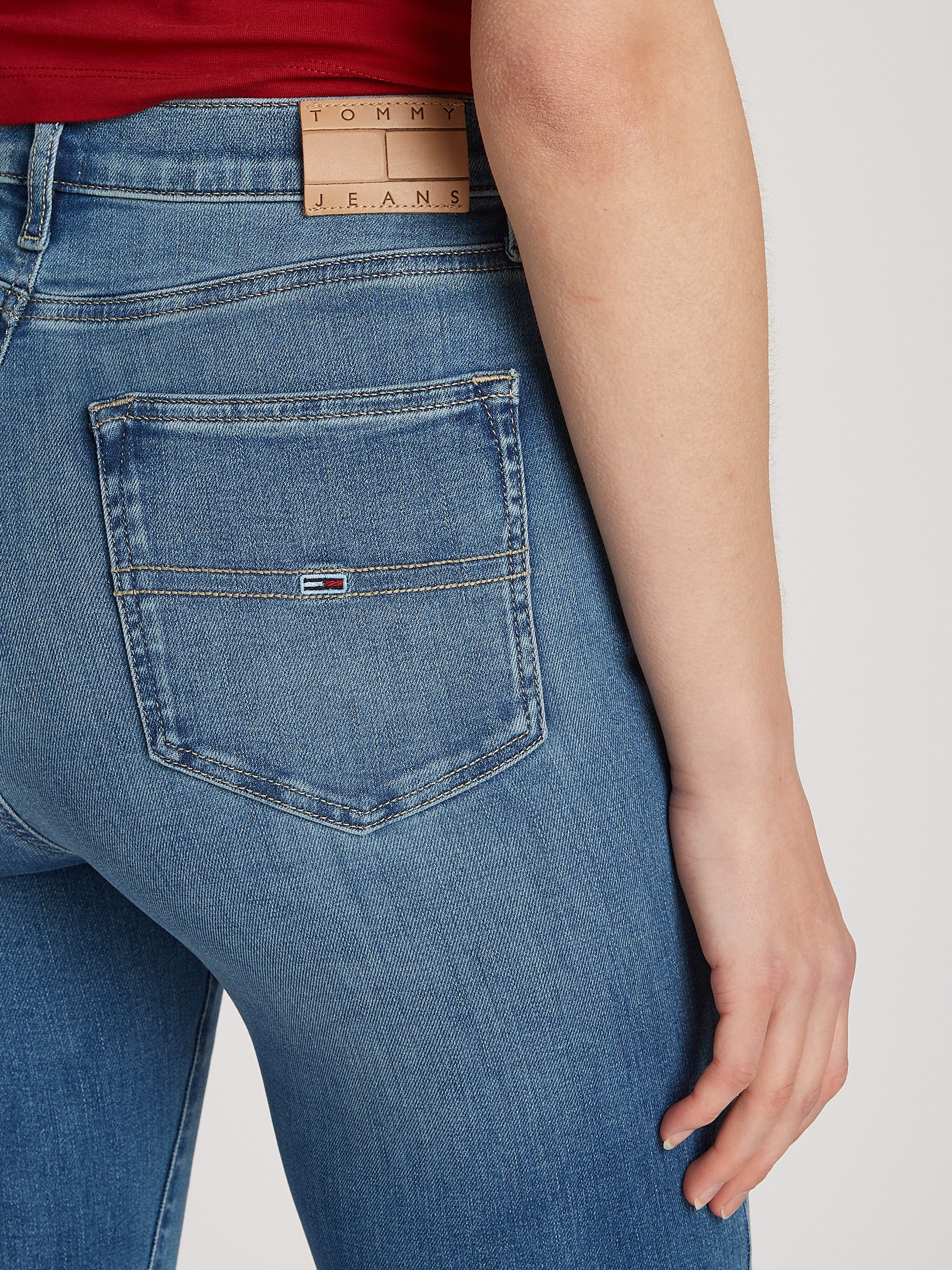 TOMMY JEANS Wijd uitlopende jeans Tommy Jeans SYLVIA - High waist - Flared Denim Jeans