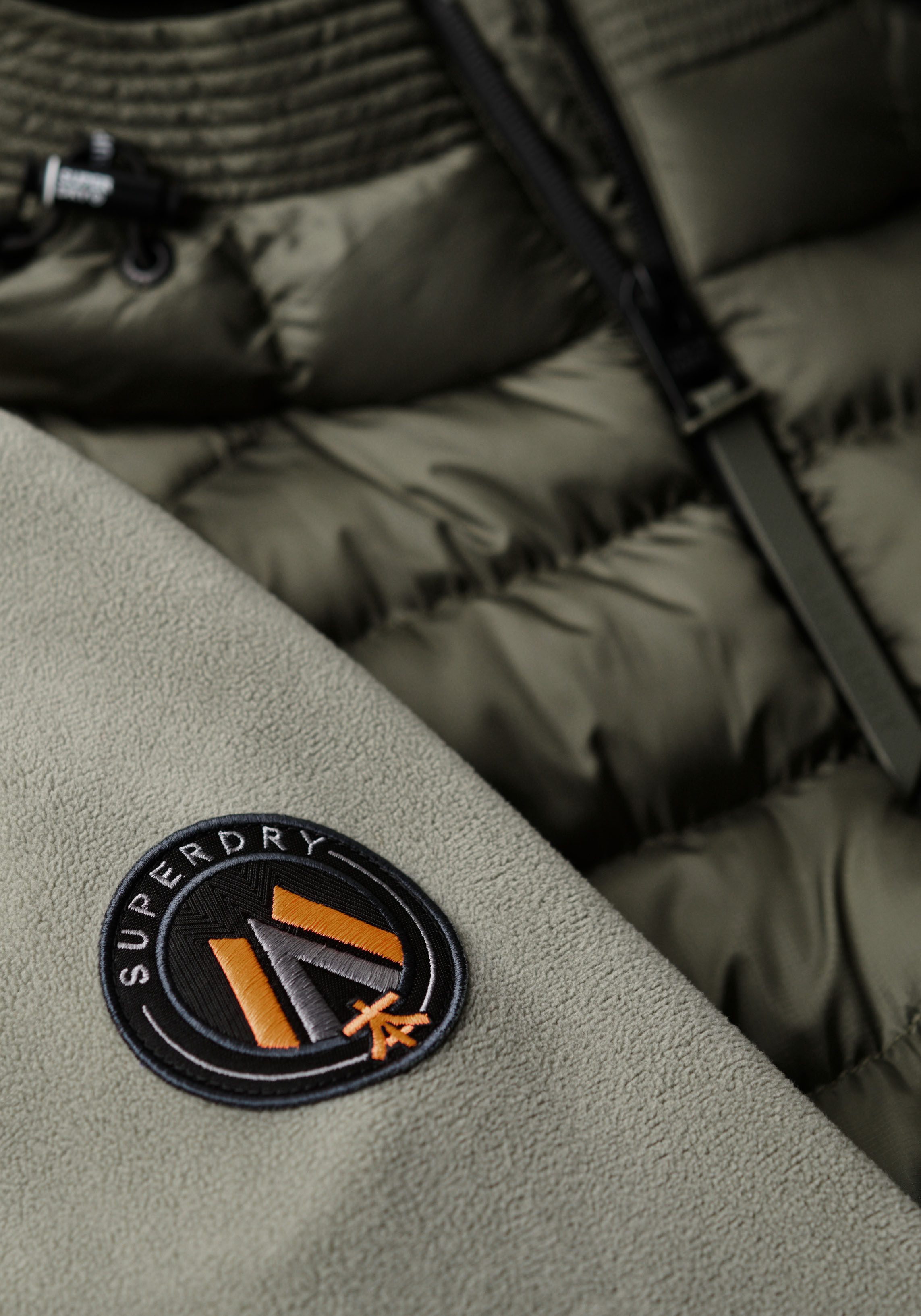 Superdry Gewatteerde jas HOODED STORM FLEECE BOMBER