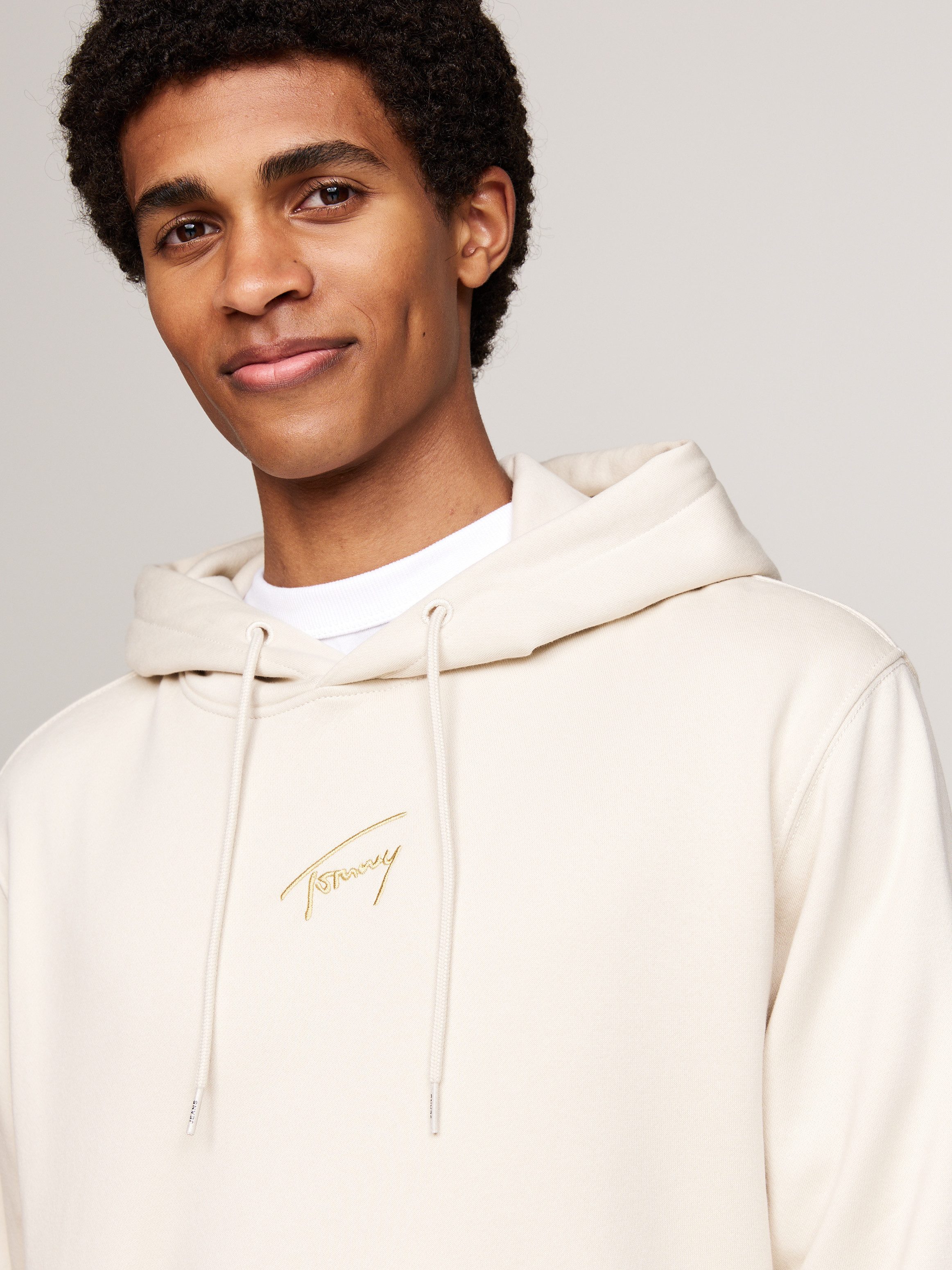 TOMMY JEANS Sweatshirt TJM REG GOLD SIGNT HOODIE EXT