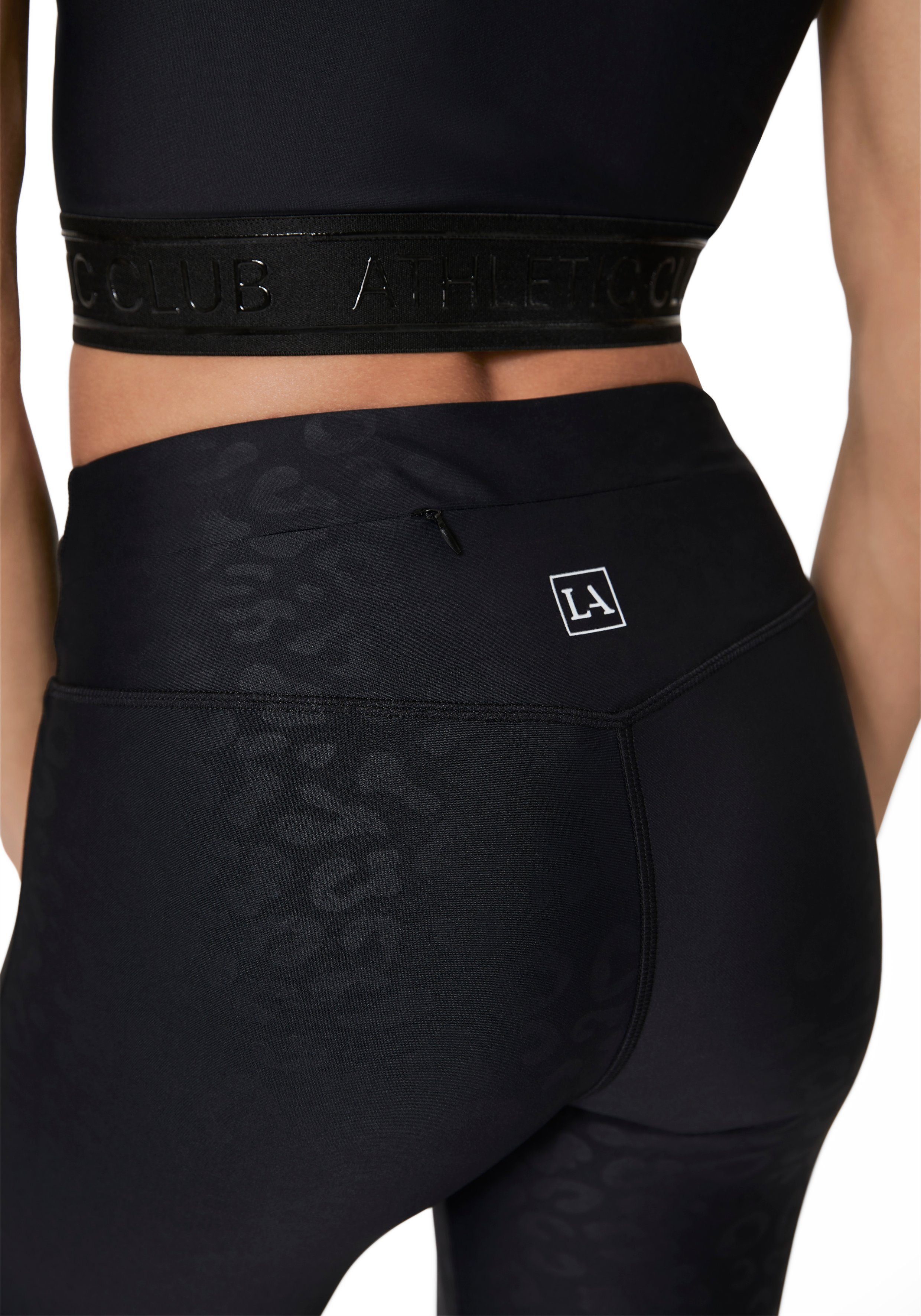 active by Lascana Functionele legging Sportleggings met V-vormige tailleband in leeuwprint