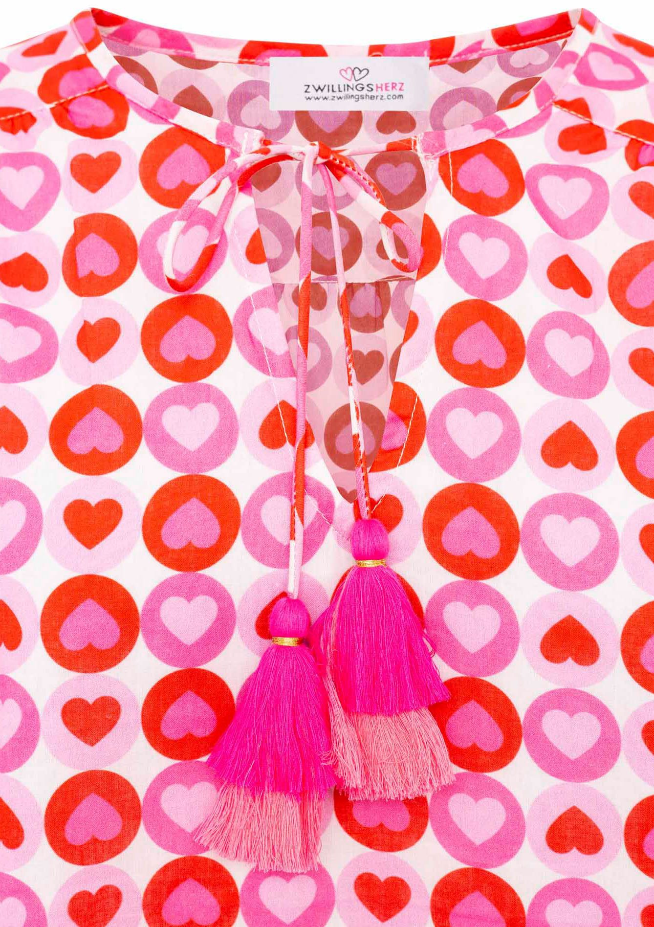 Zwillingsherz Shirtblouse Bloemenpatroon, kwastjes, pompon afwerking, lange mouw