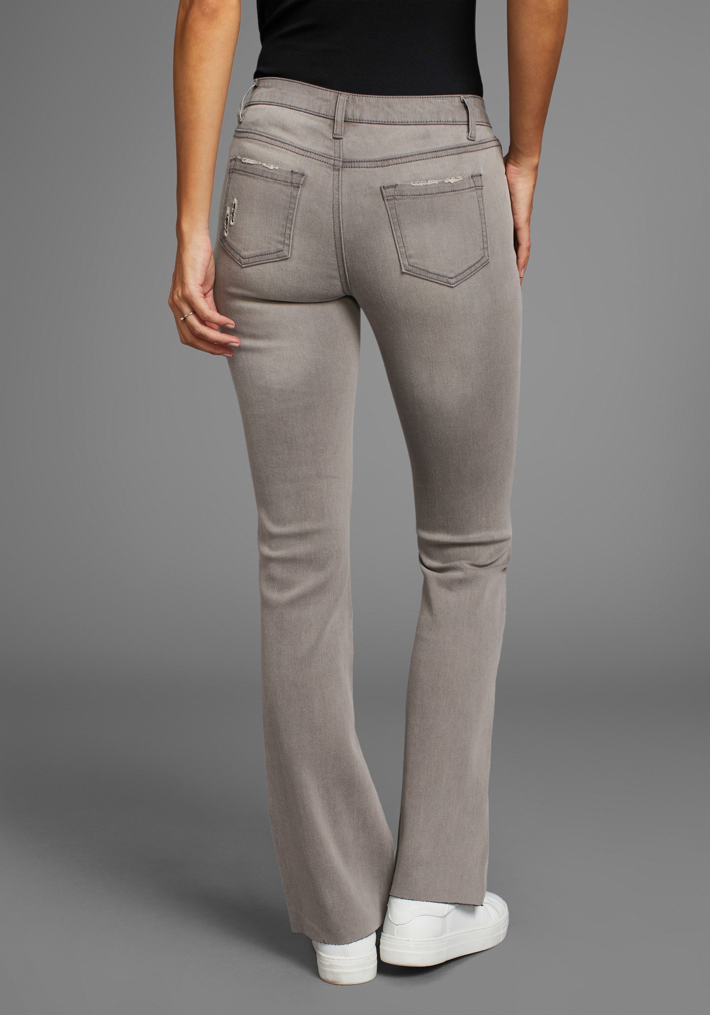 Arizona Bootcut jeans Ultra Stretch uitlopende pasvorm, modieuze used-look, normale taille