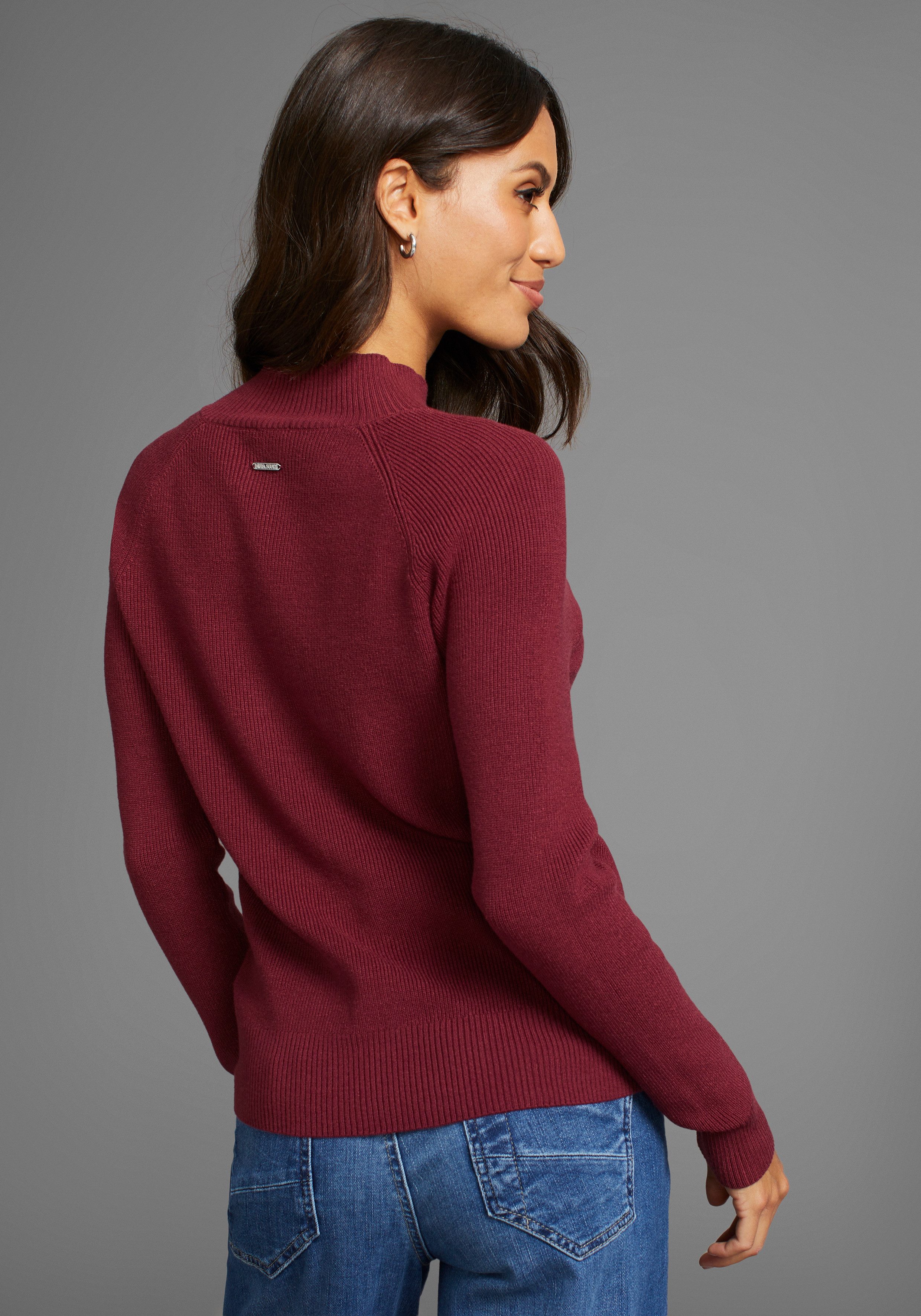 Laura Scott Gebreide trui met knoopdetail