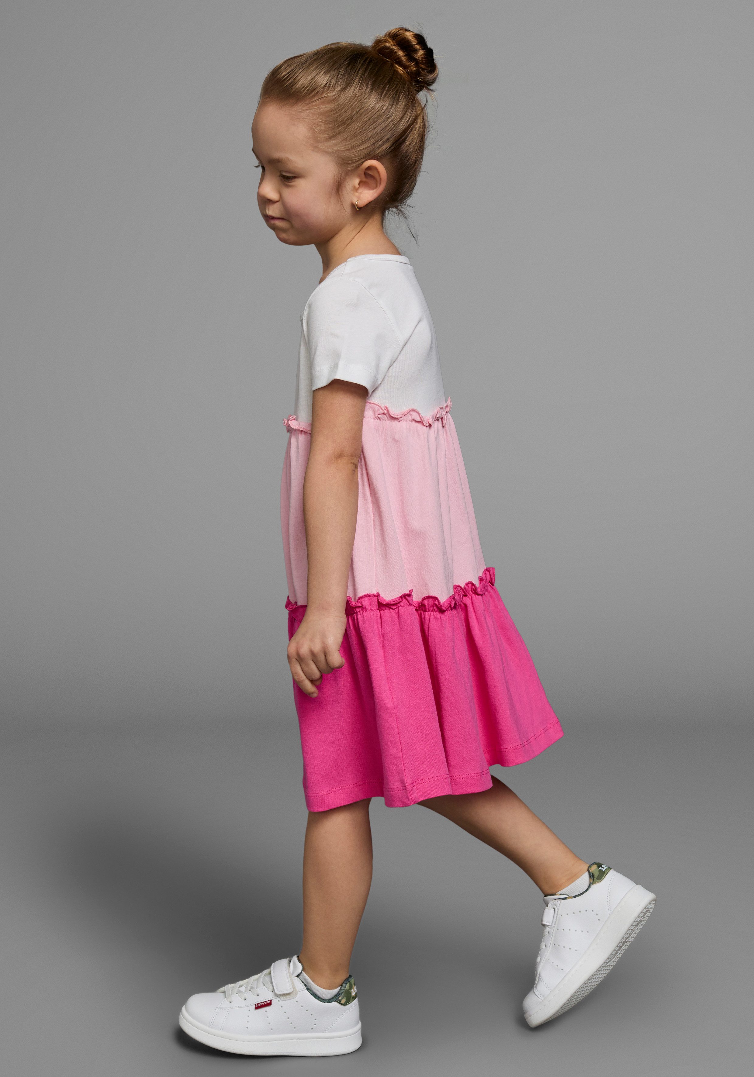 KIDSWORLD Jerseyjurk - Volantjurk voor kleine meisjes feestelijke gelegenheden, knie-vrije lengte, speelse stijl