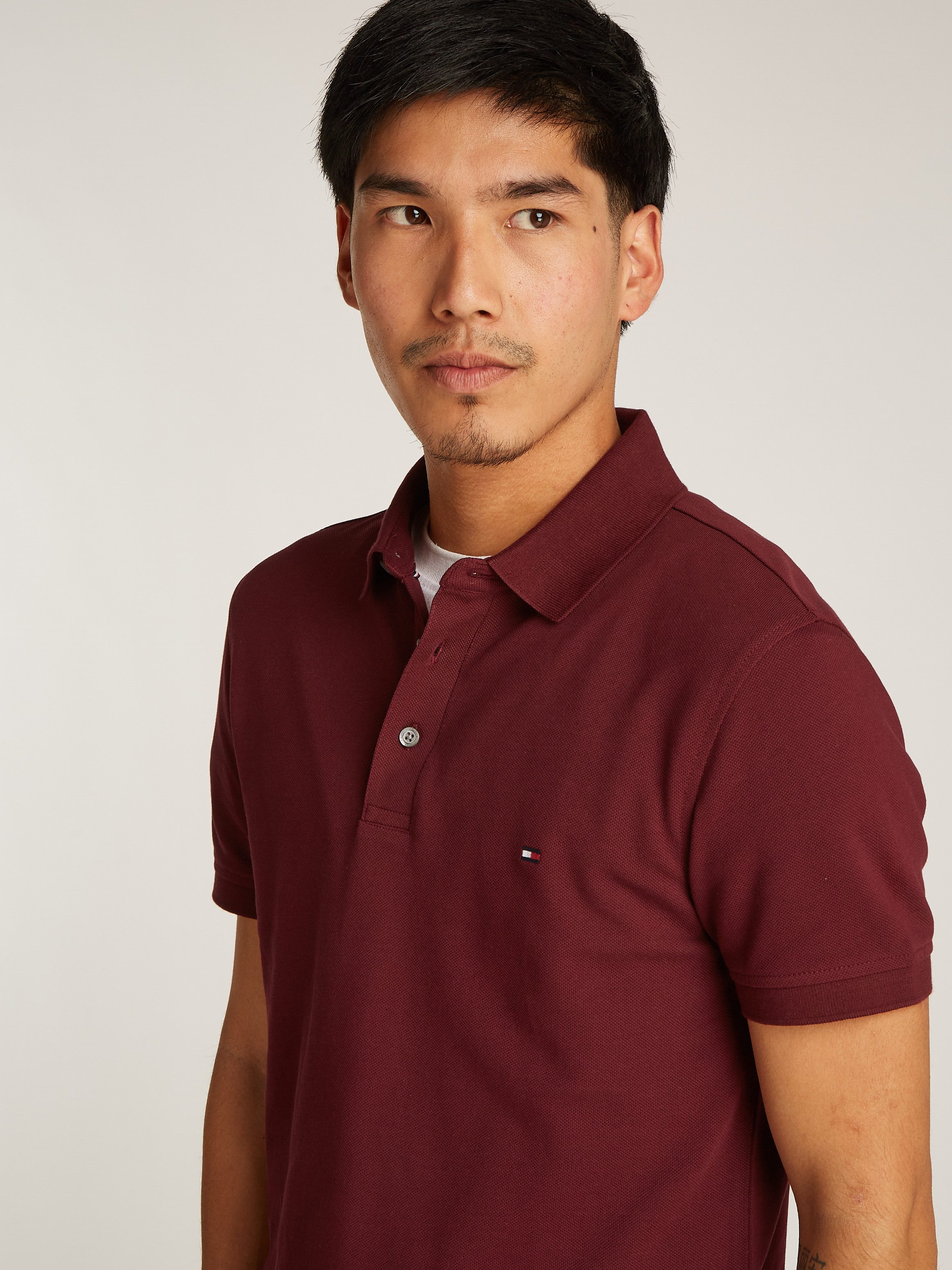 Tommy Hilfiger Poloshirt 1985 SLIM POLO met piquéstructuur en borduursel