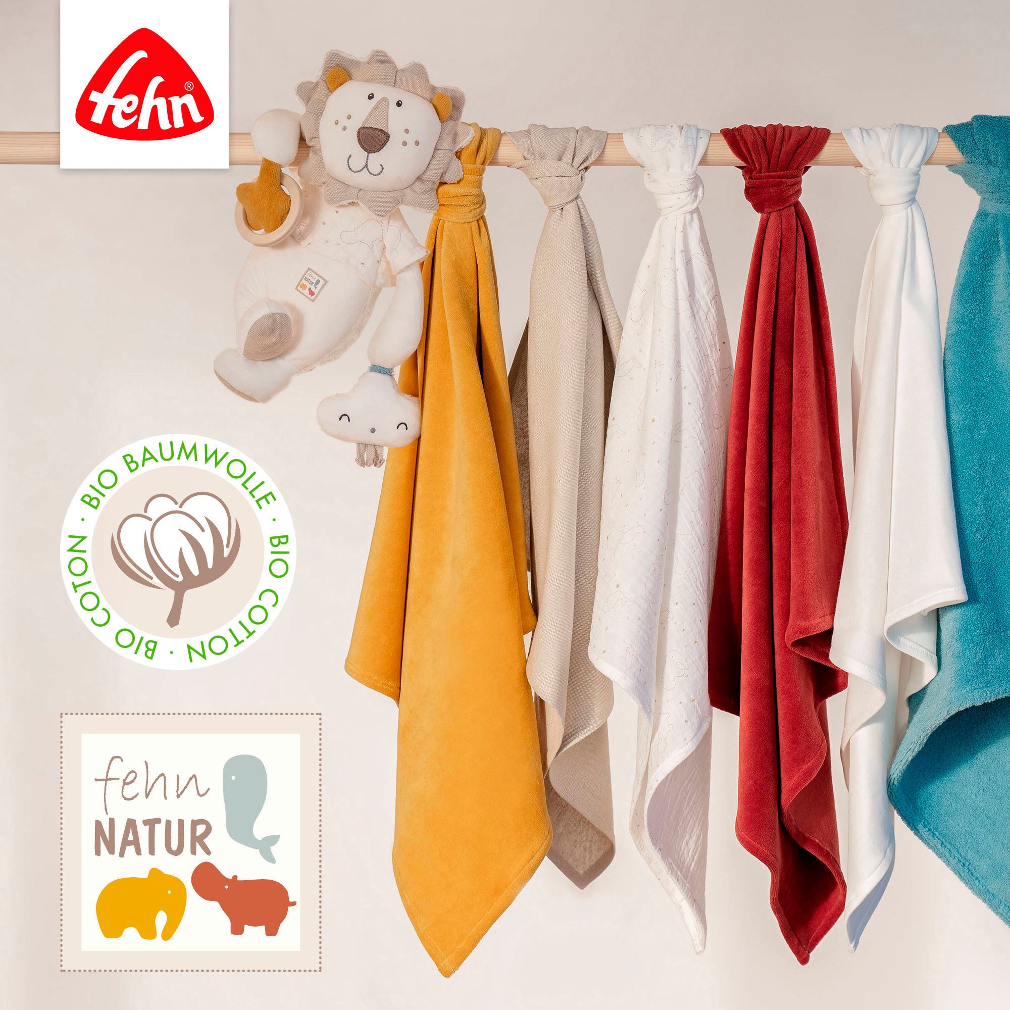 Fehn Knuffeldoek FehnNATUR, Leeuw Deluxe met bevestigingsring voor speen, bevat bio-katoen