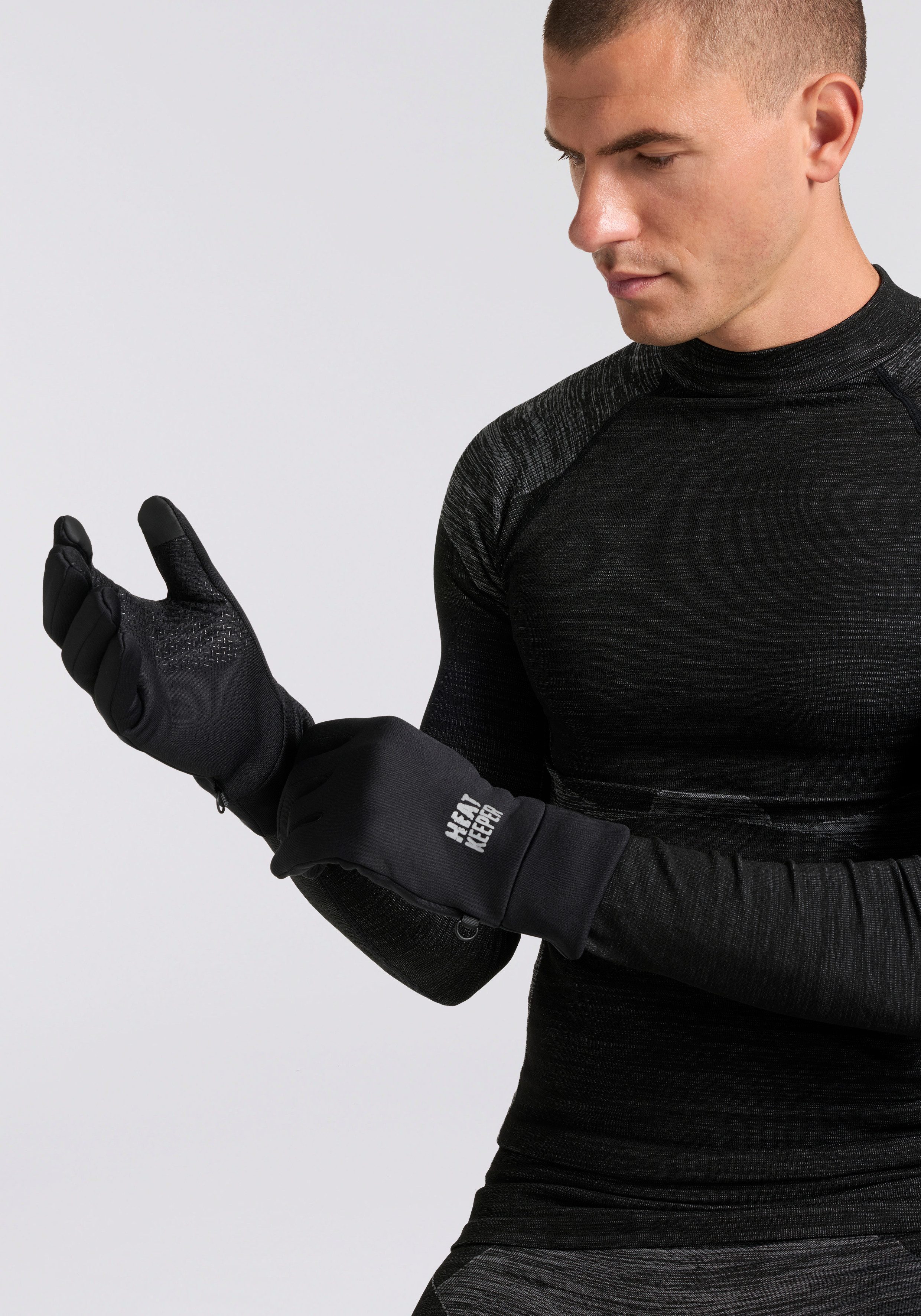 HEAT keeper Fleece-handschoenen met siliconen afwerking op de handpalm en i-touch profielen op de duim