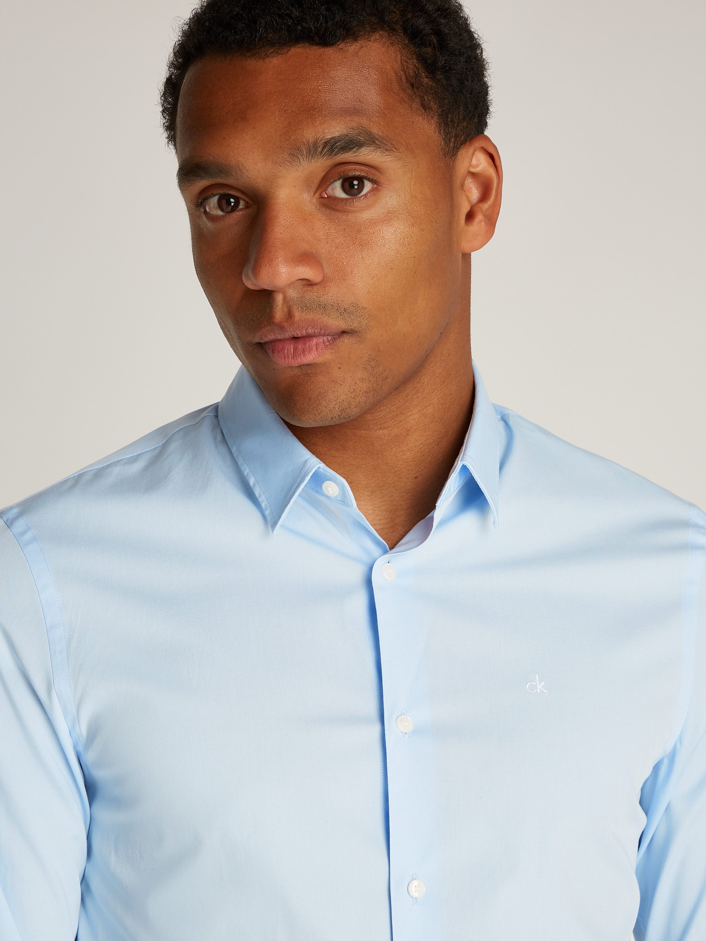 Calvin Klein Businessoverhemd STRETCH POPLIN SLIM SHIRT met calvin klein-logo op de borst