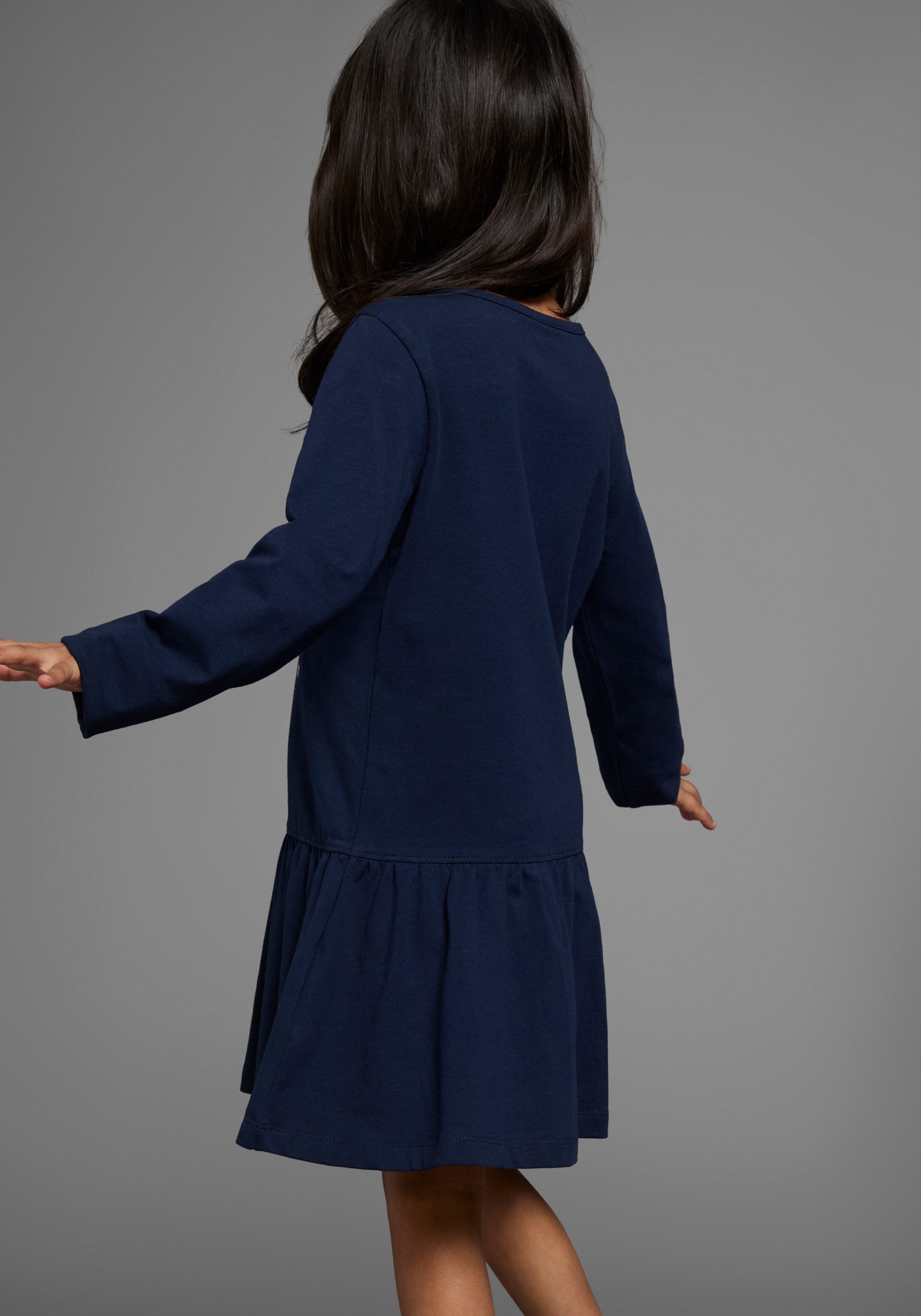KIDSWORLD Jerseyjurk HAPPY GLITZER TAG knie-vrije lengte, speelse look, van katoenmix