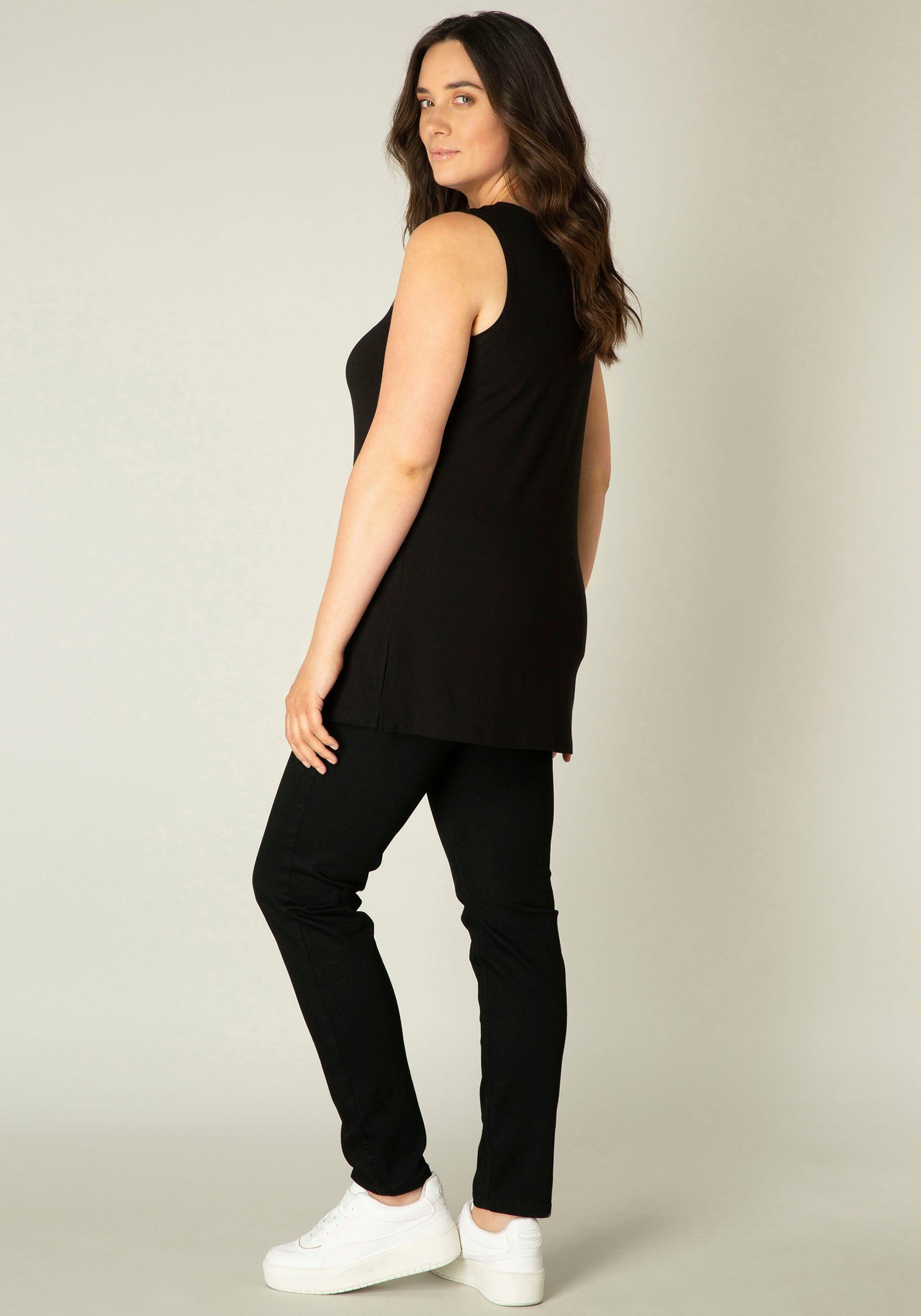 Base Level Curvy Top Over de heupen vallend model met splitjes bij de zoom