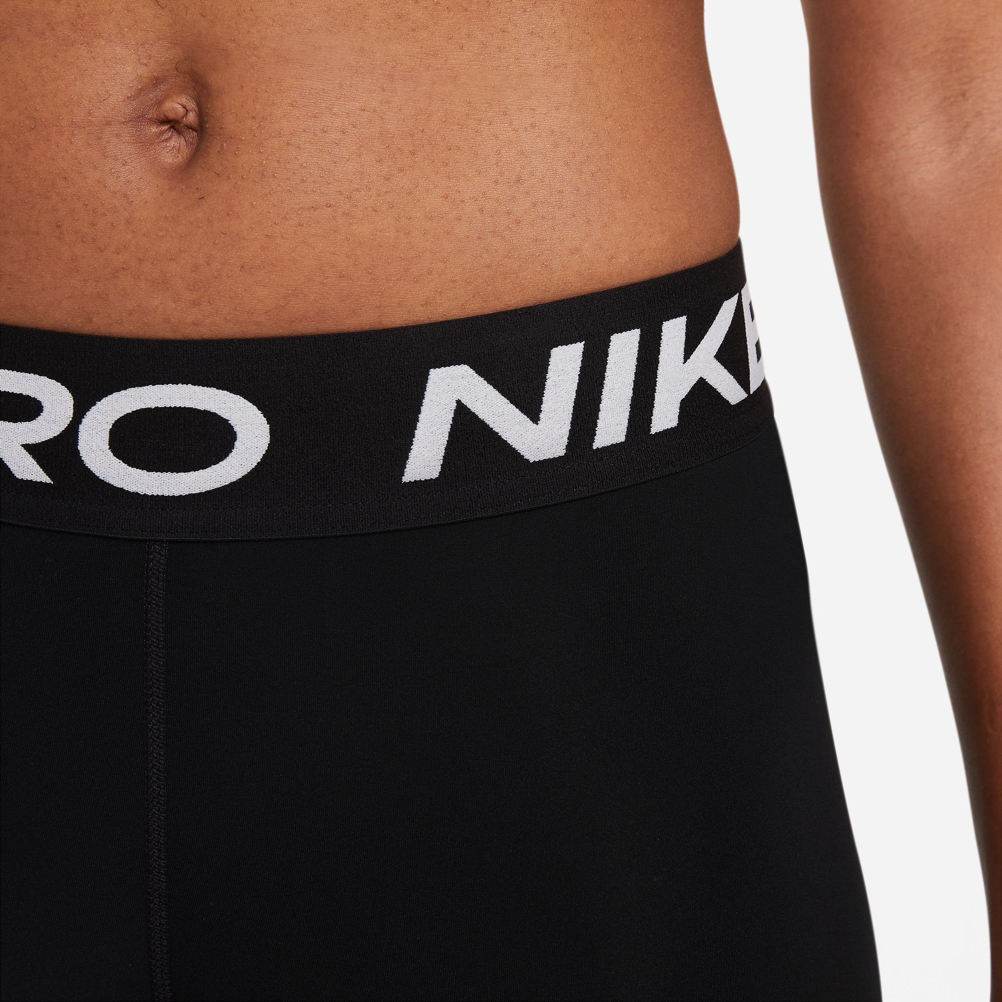 Nike Trainingstights PRO WOMEN'S MID-RISE MESH-PANELED LEGGINGS