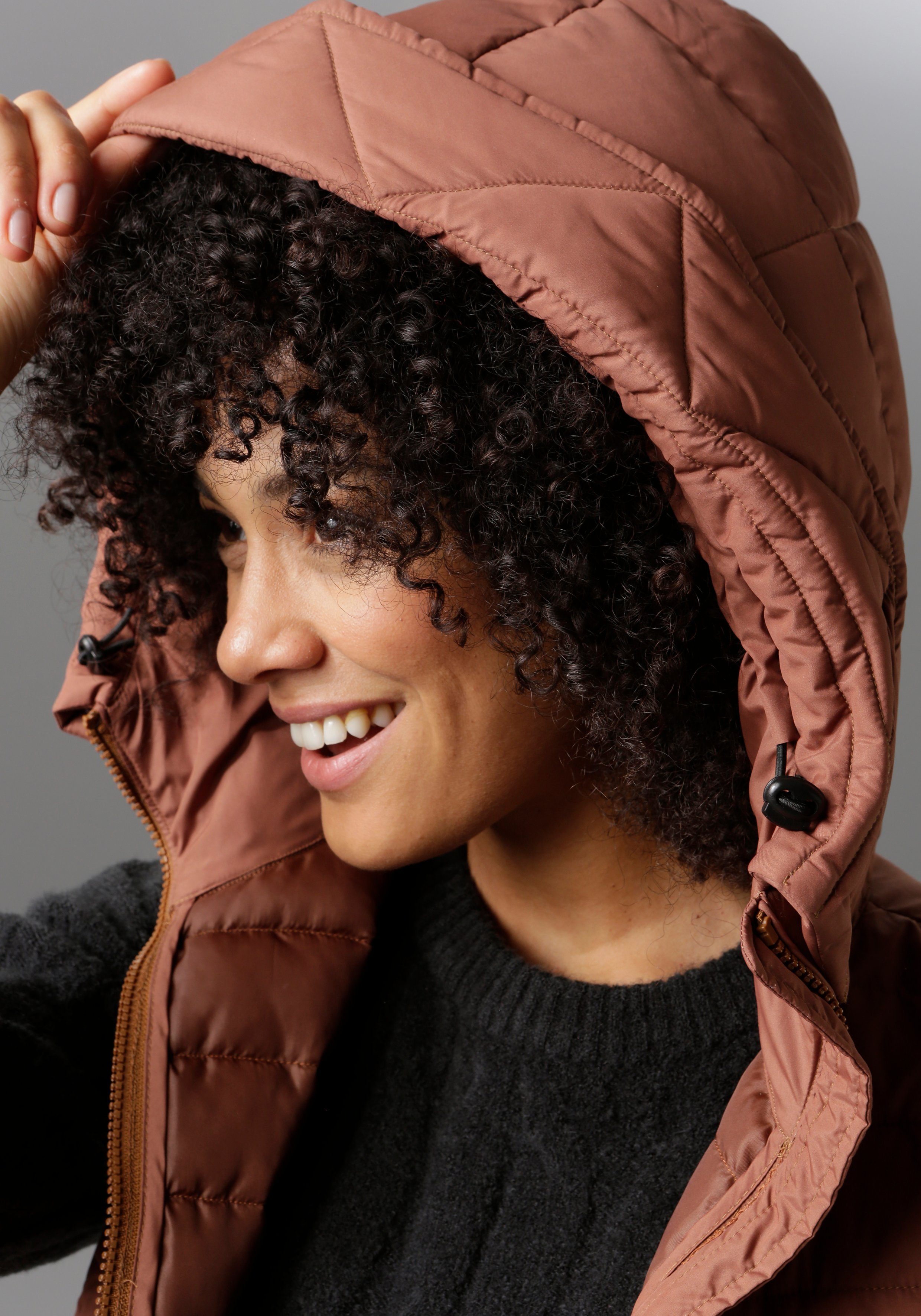 Aniston CASUAL Bodywarmer met verstelbare capuchon