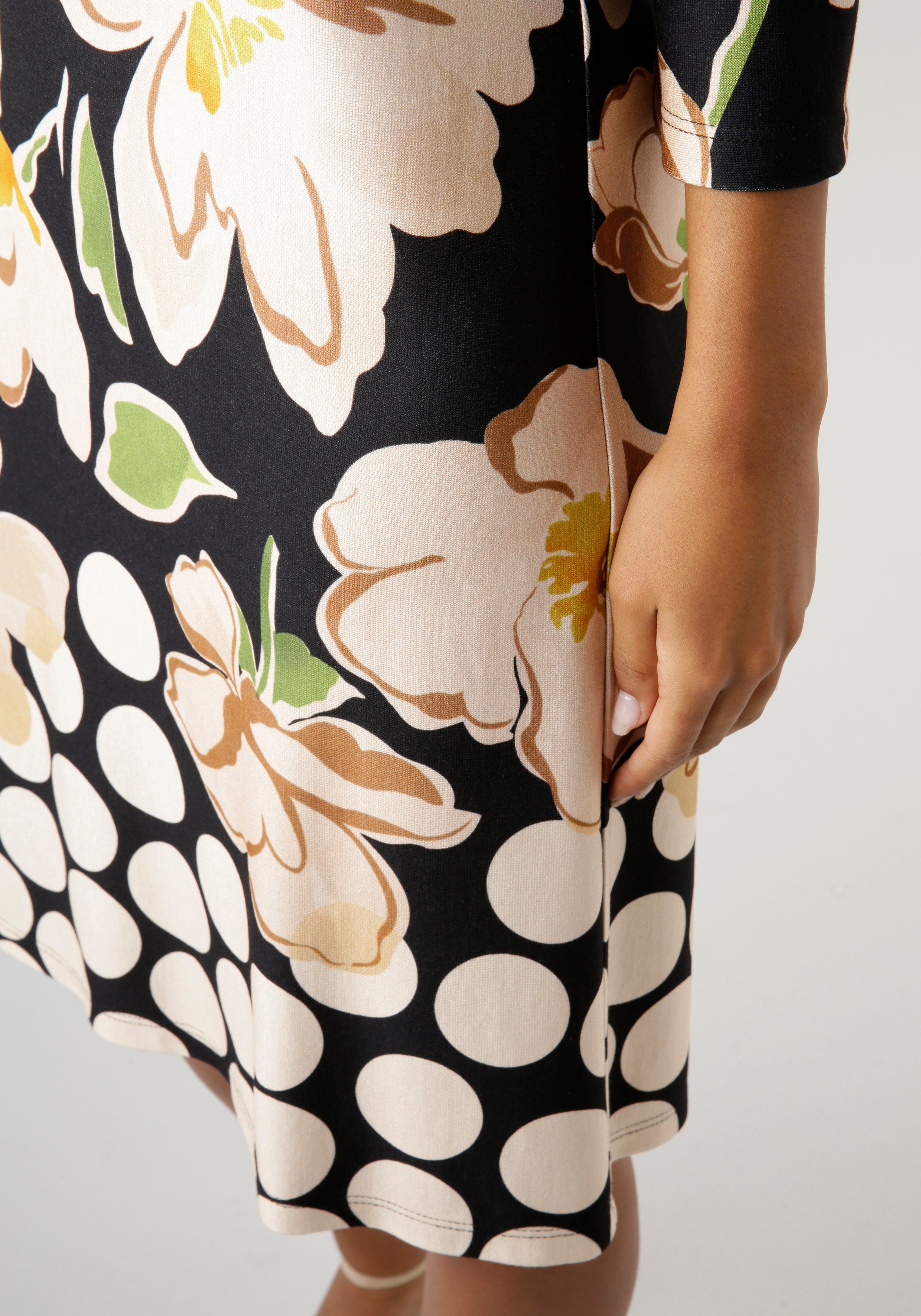 Aniston SELECTED Jerseyjurk met stippen aan de zoom nieuwe collectie